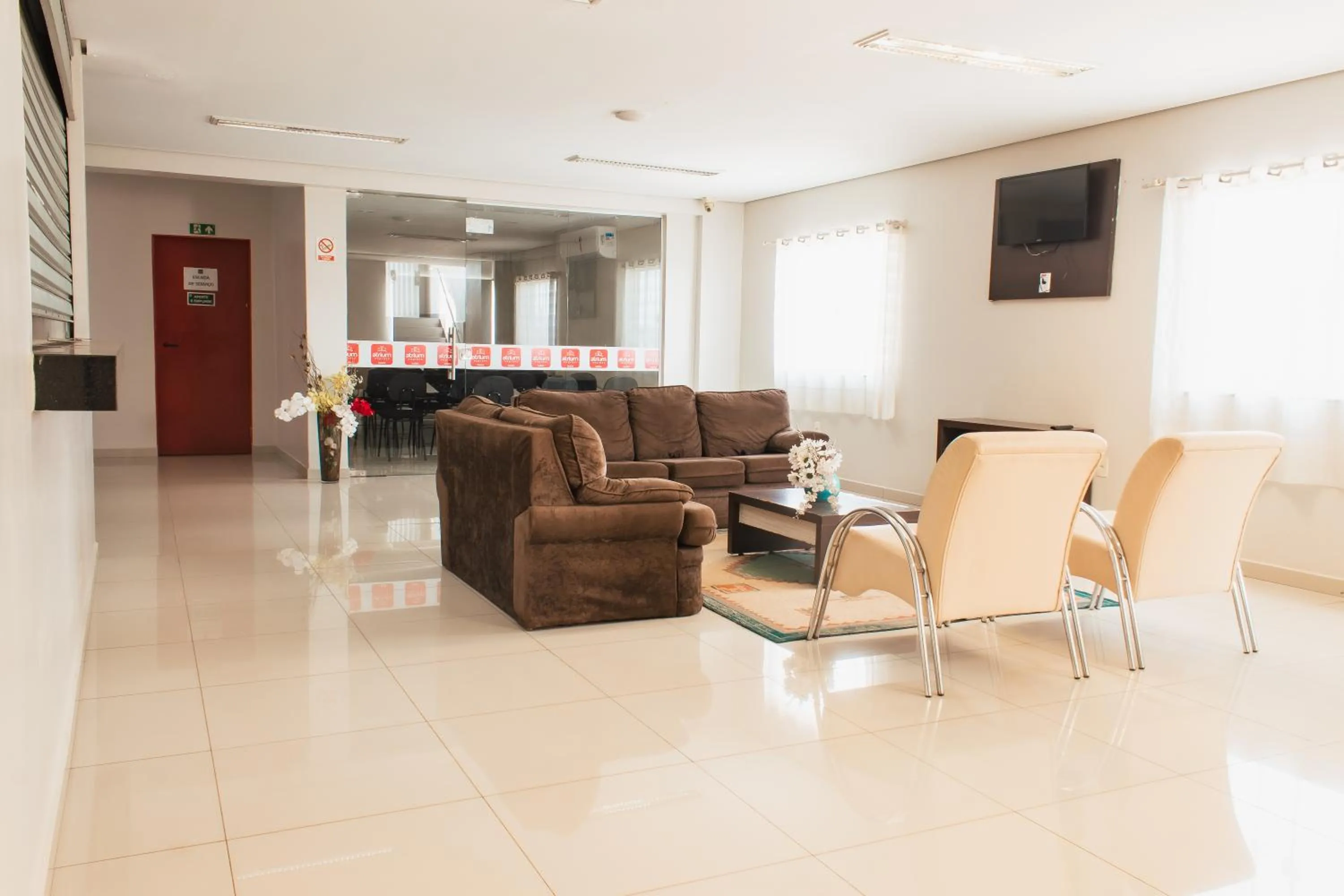 Seating area in Atrium Express Hotels