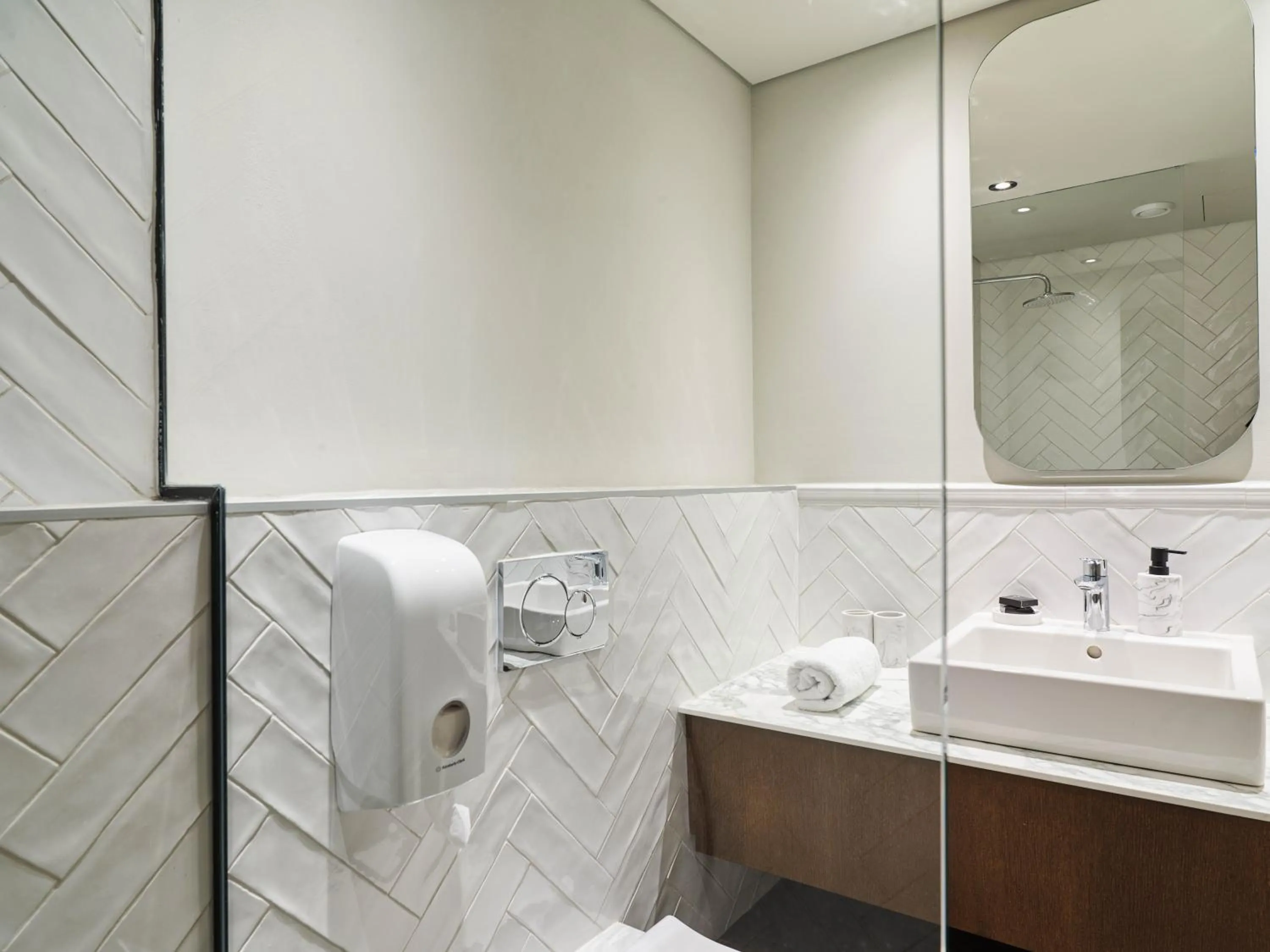 Bathroom in LIV The City Suites ADULTS ONLY