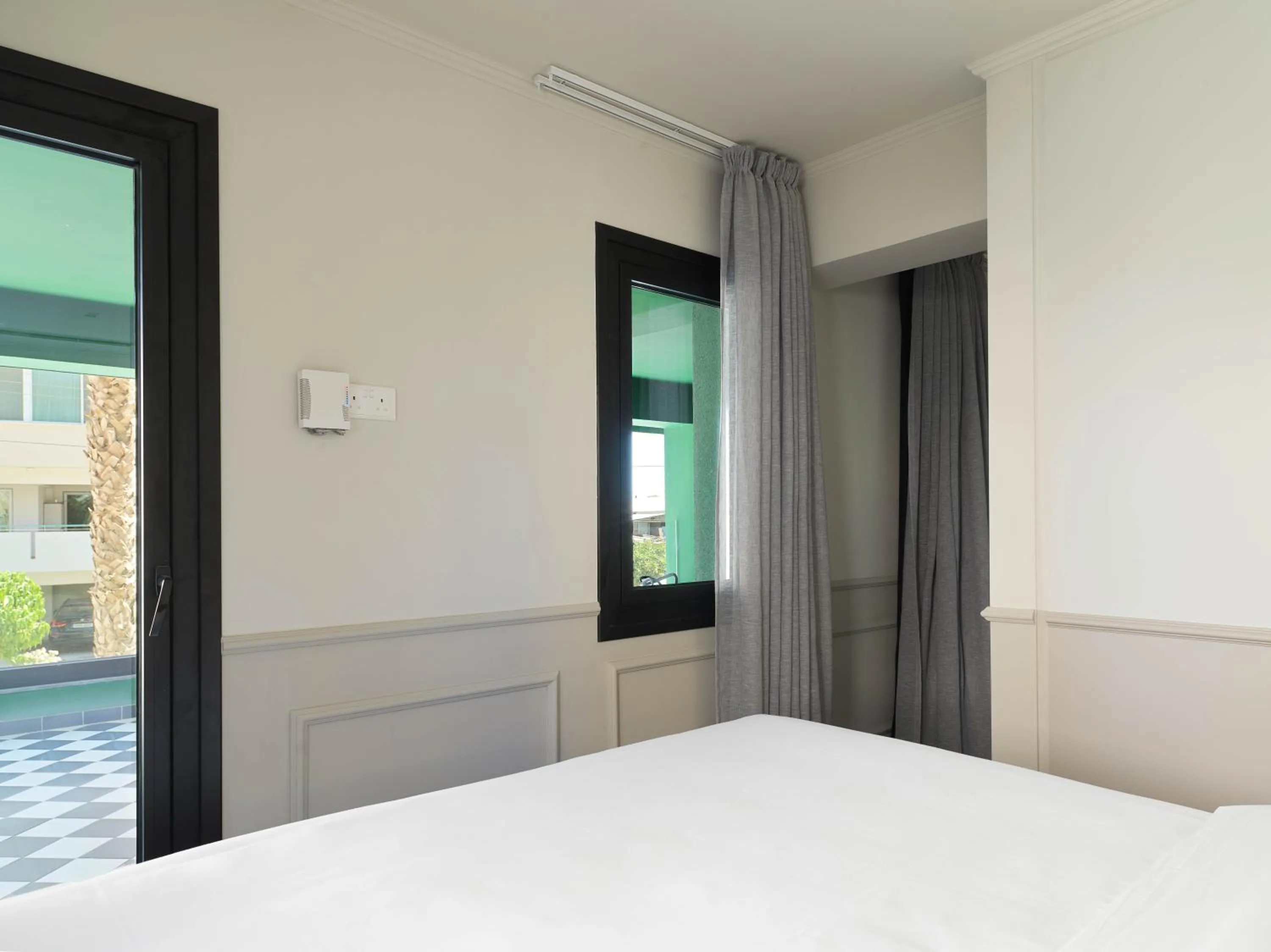 Patio, Bed in LIV The City Suites ADULTS ONLY