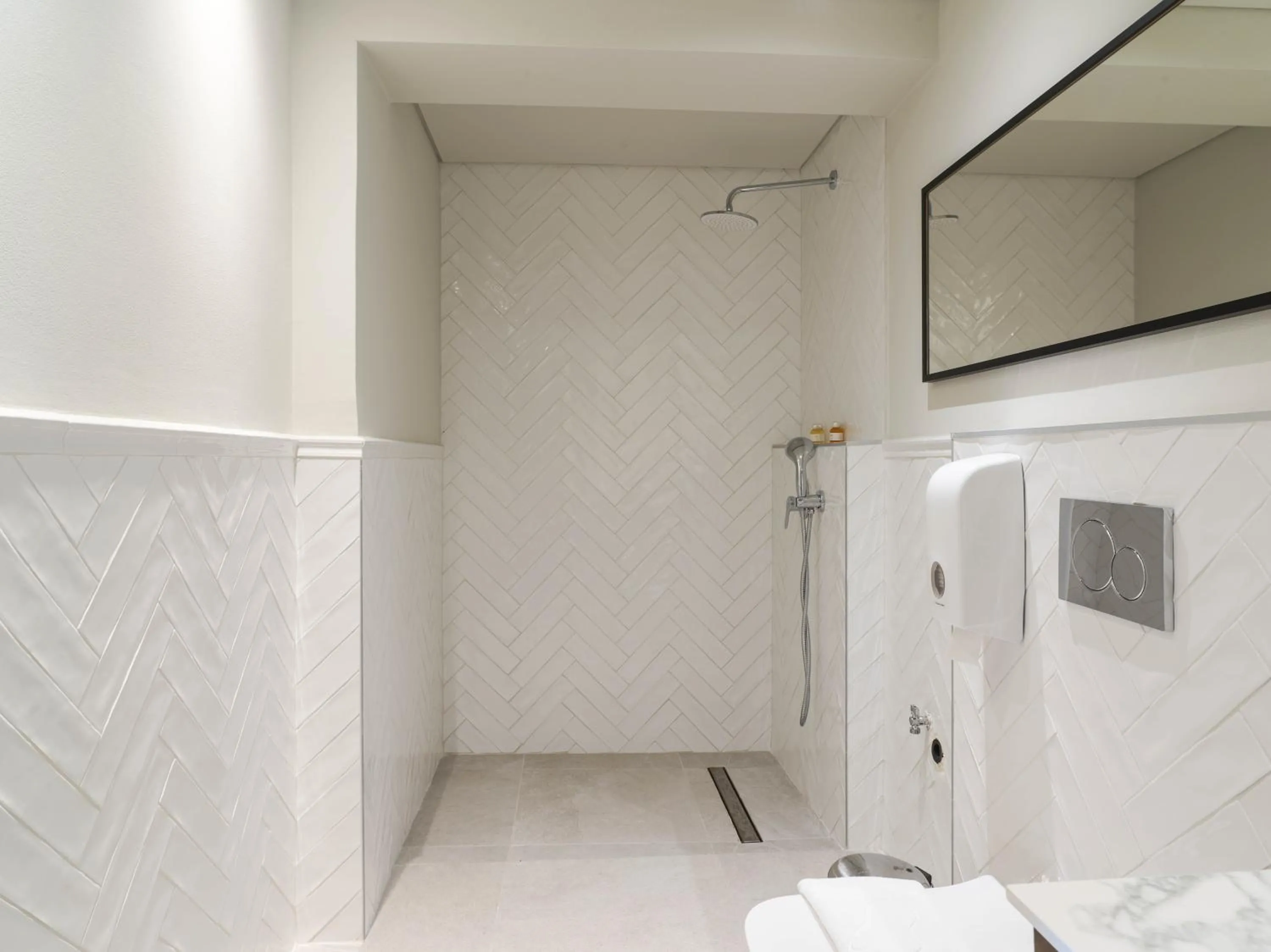 Shower in LIV The City Suites ADULTS ONLY