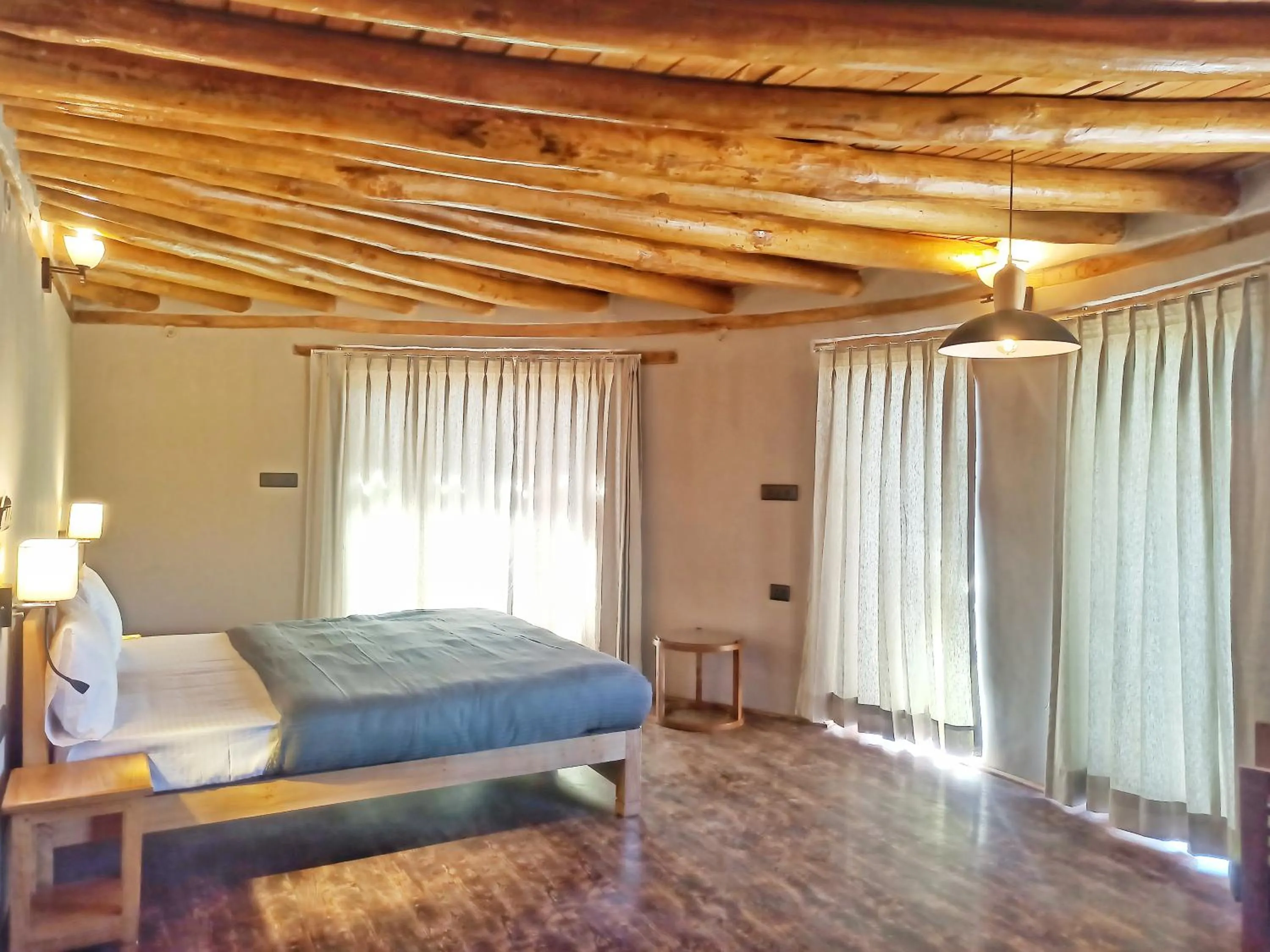 Photo of the whole room, Bed in Dakpa House Ladakh