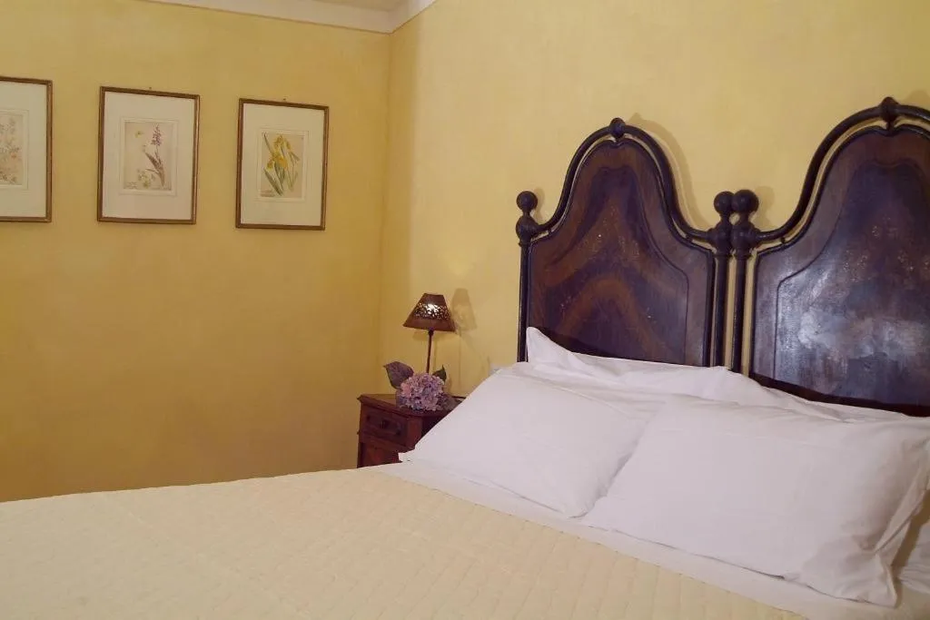 Photo of the whole room, Bed in La Tavola Dei Cavalieri