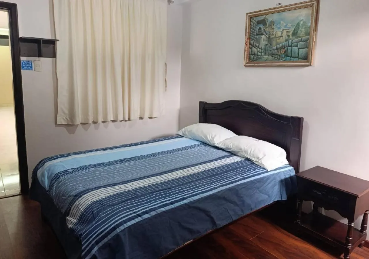 Property building, Bed in HOTEL SARAGURO LOJA