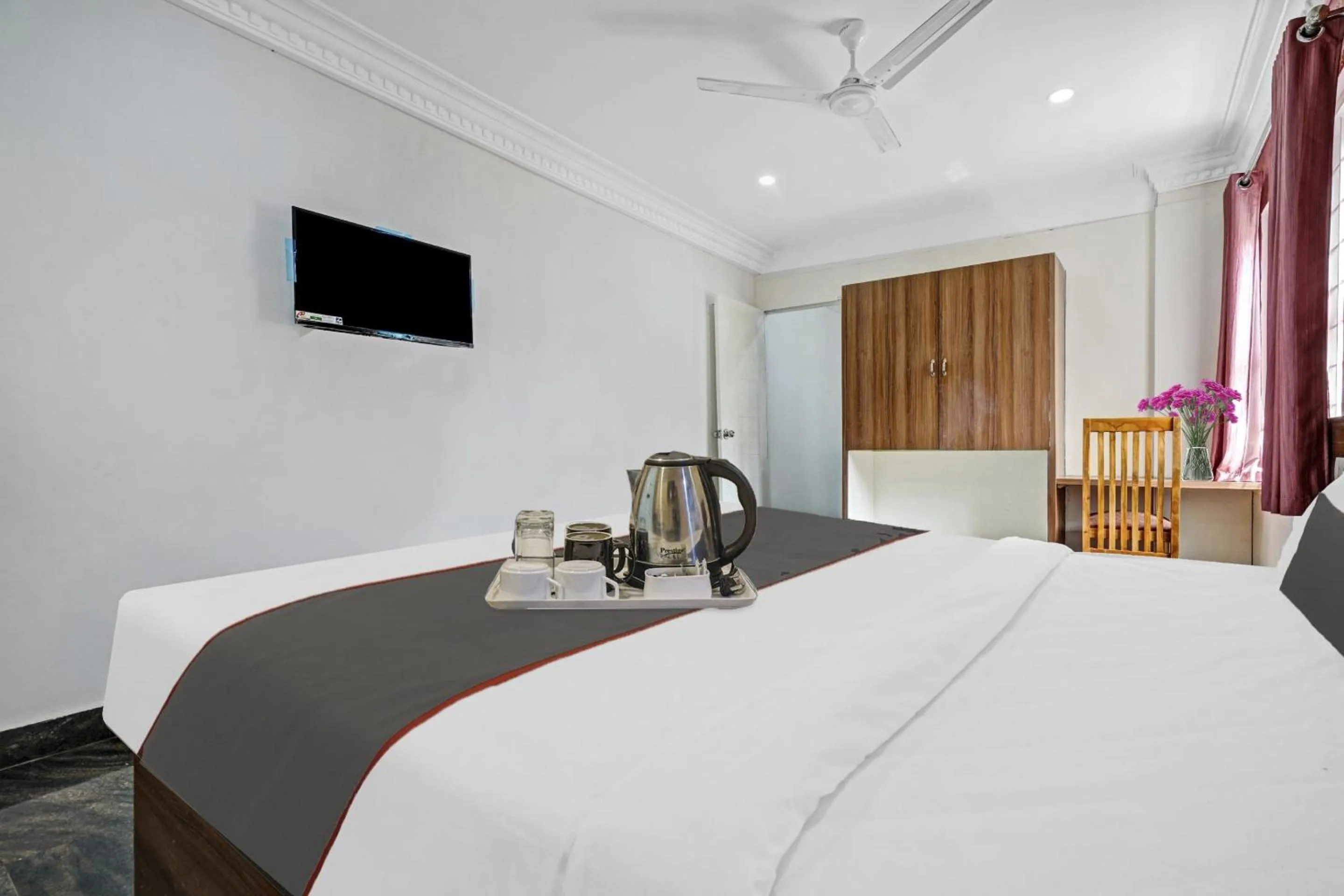 Bedroom, Bed in Capital O Rayan Plaza