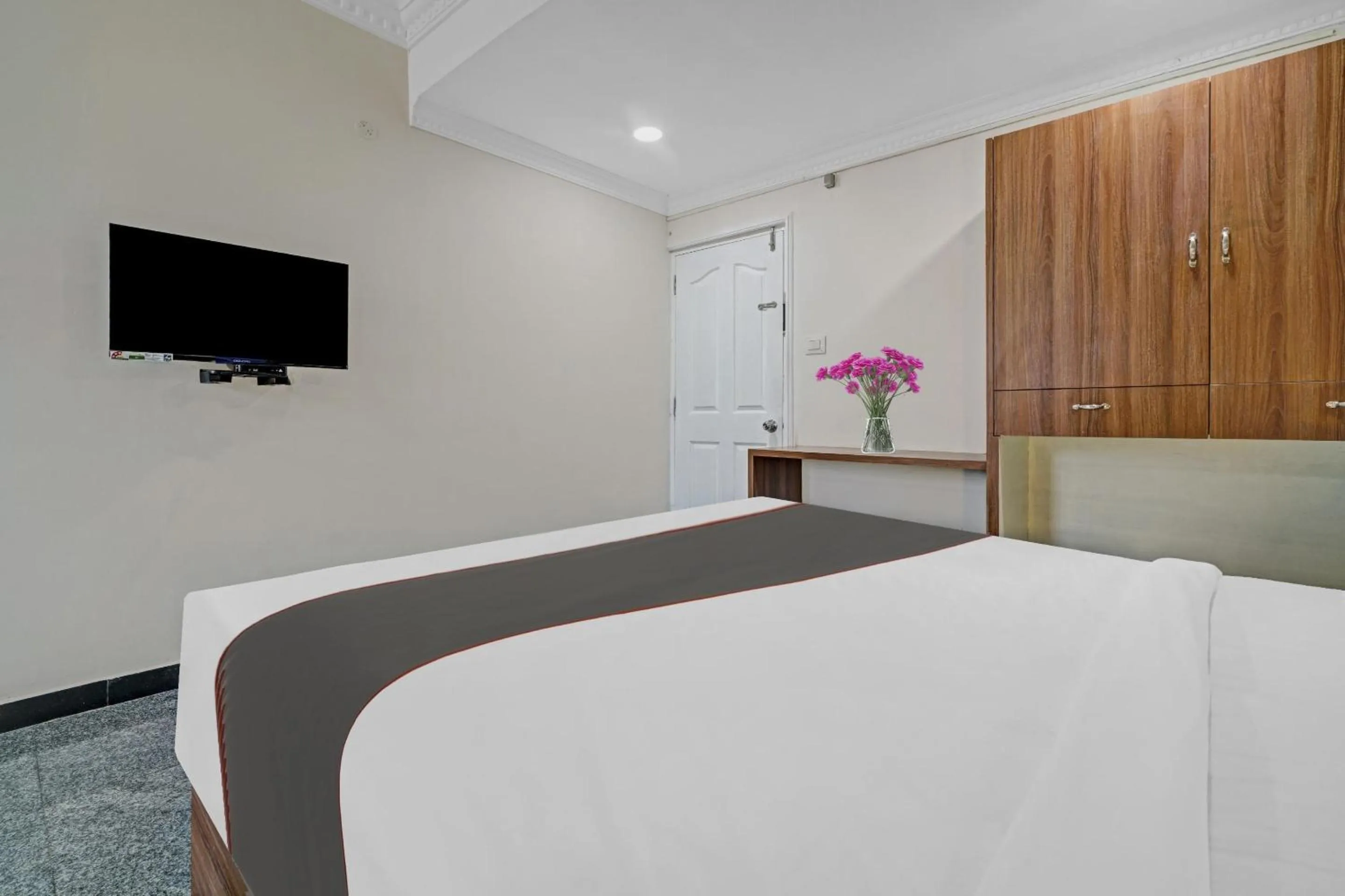 Bedroom, Bed in Capital O Rayan Plaza