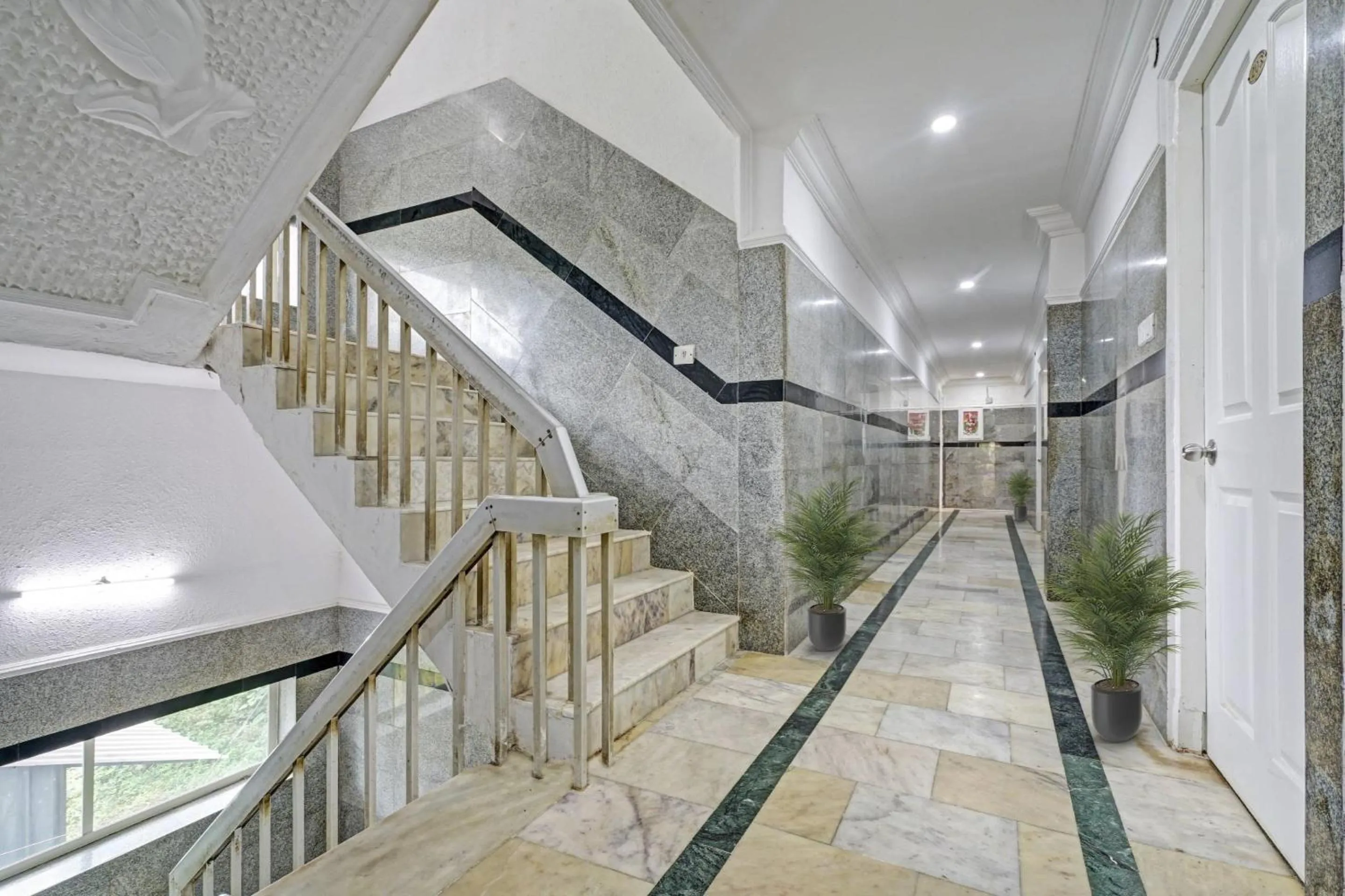 Bedroom in Capital O Rayan Plaza