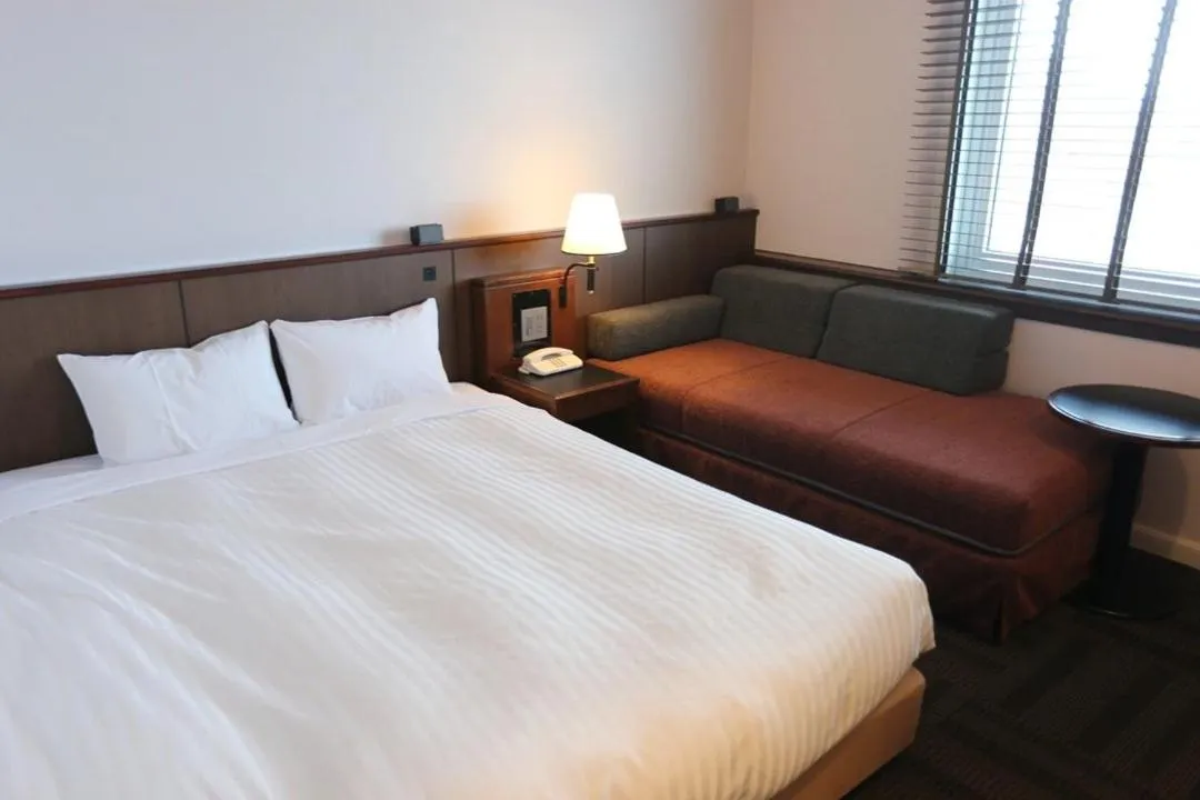 Bed in Hotel Castle Inn Tsu