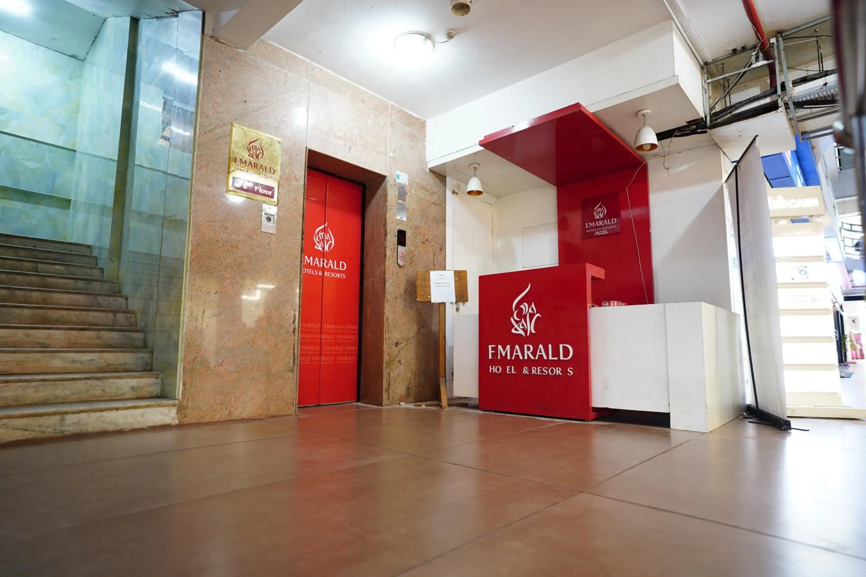 Property logo or sign in Emarald Hotel Calicut