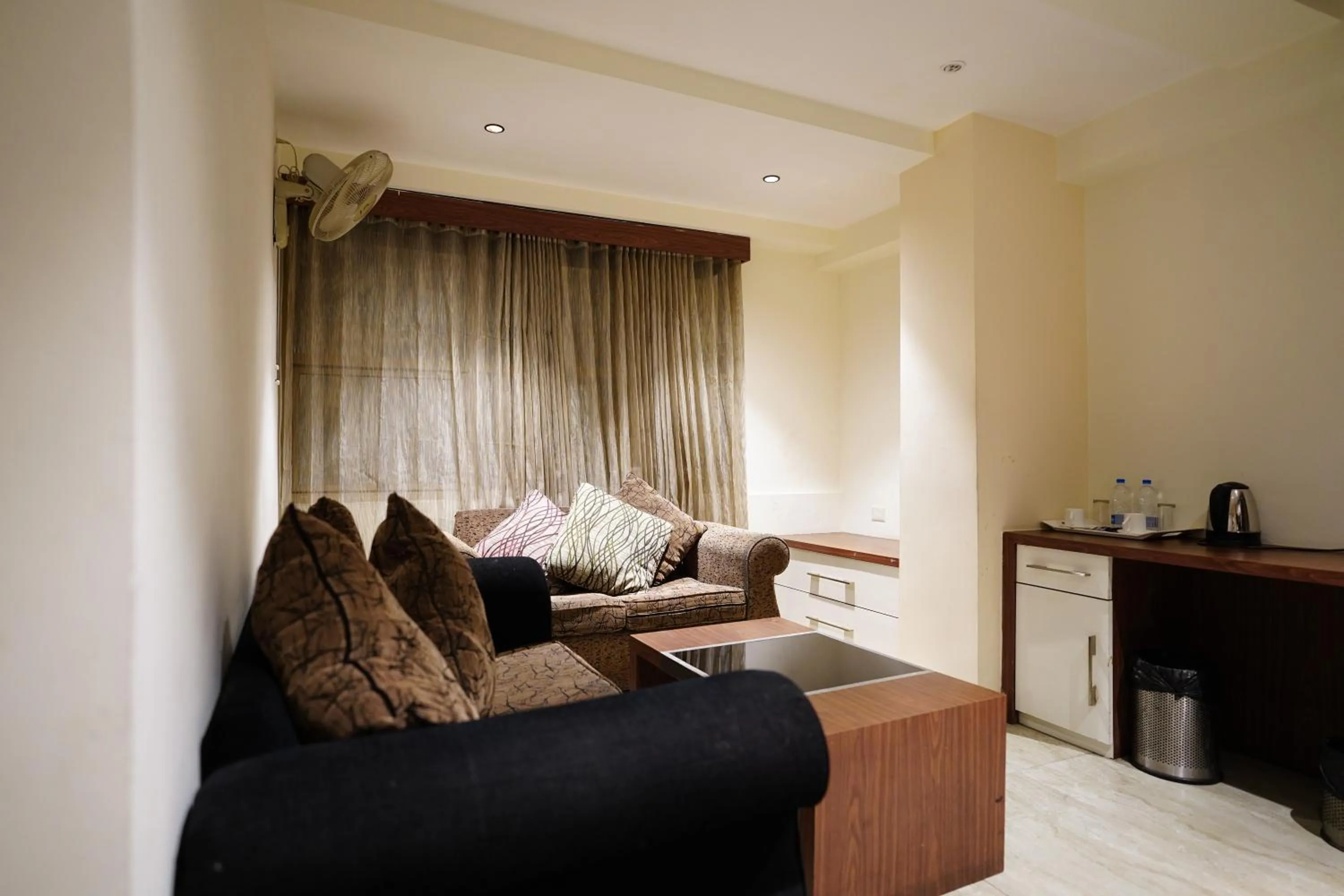 Bed in Emarald Hotel Calicut