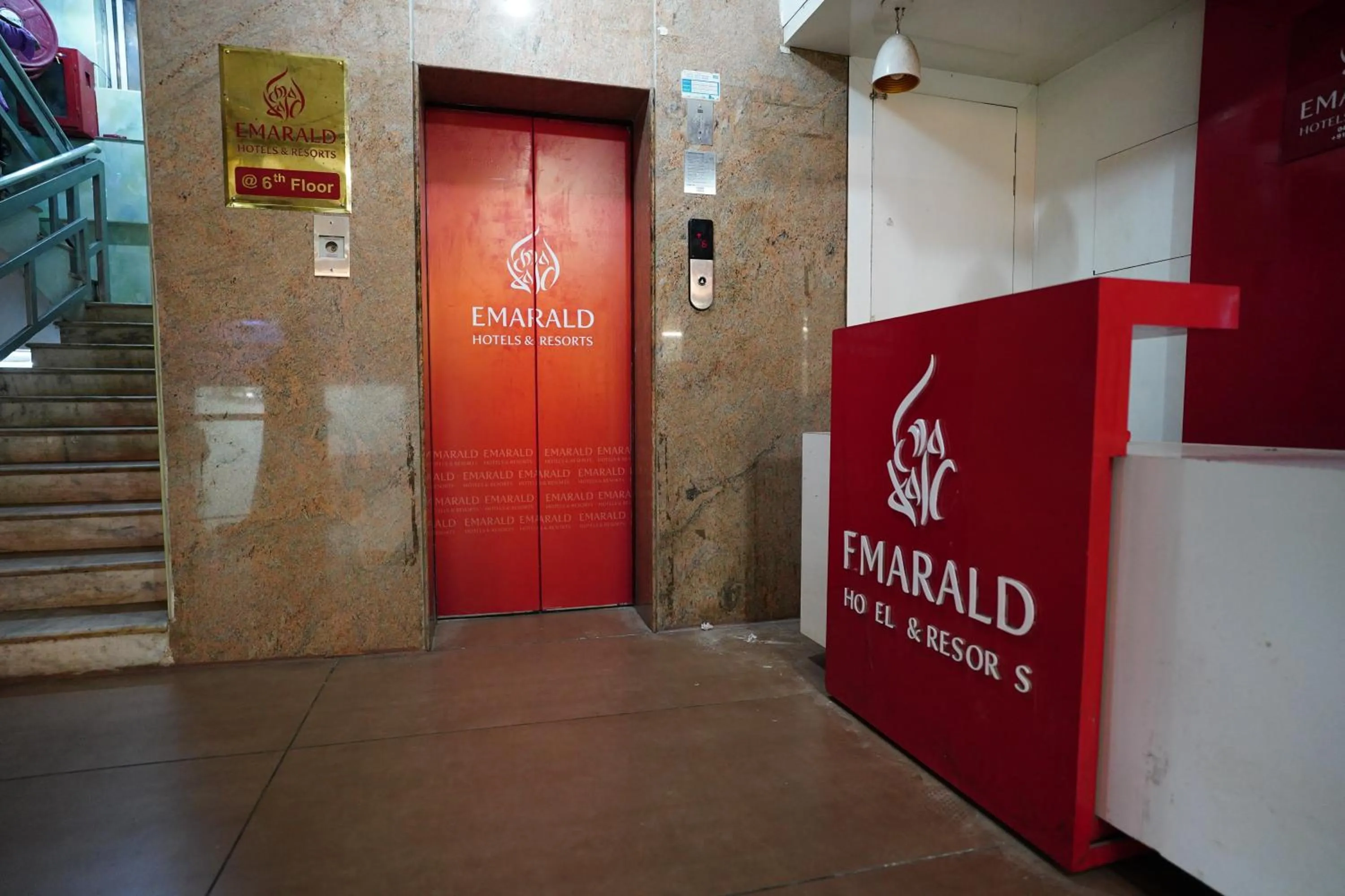 Property logo or sign in Emarald Hotel Calicut