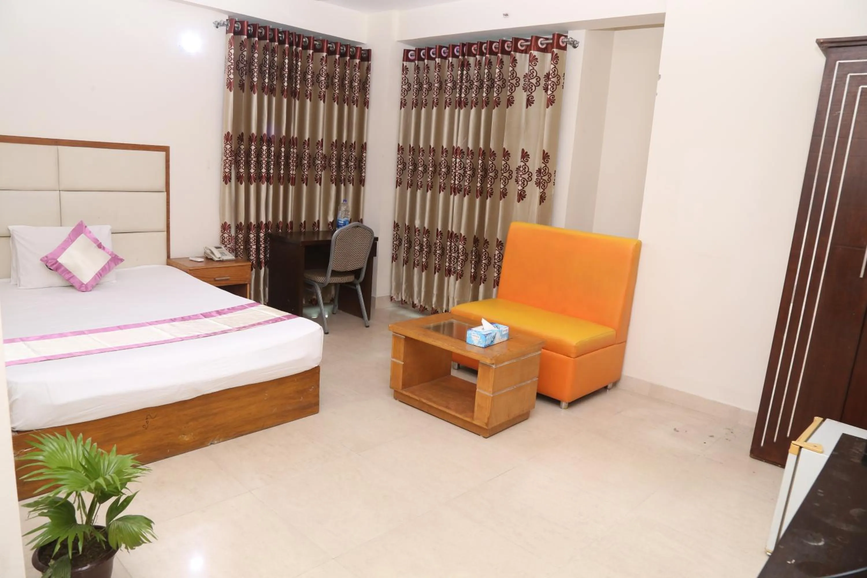 Bed in Platinum Hotel Ltd