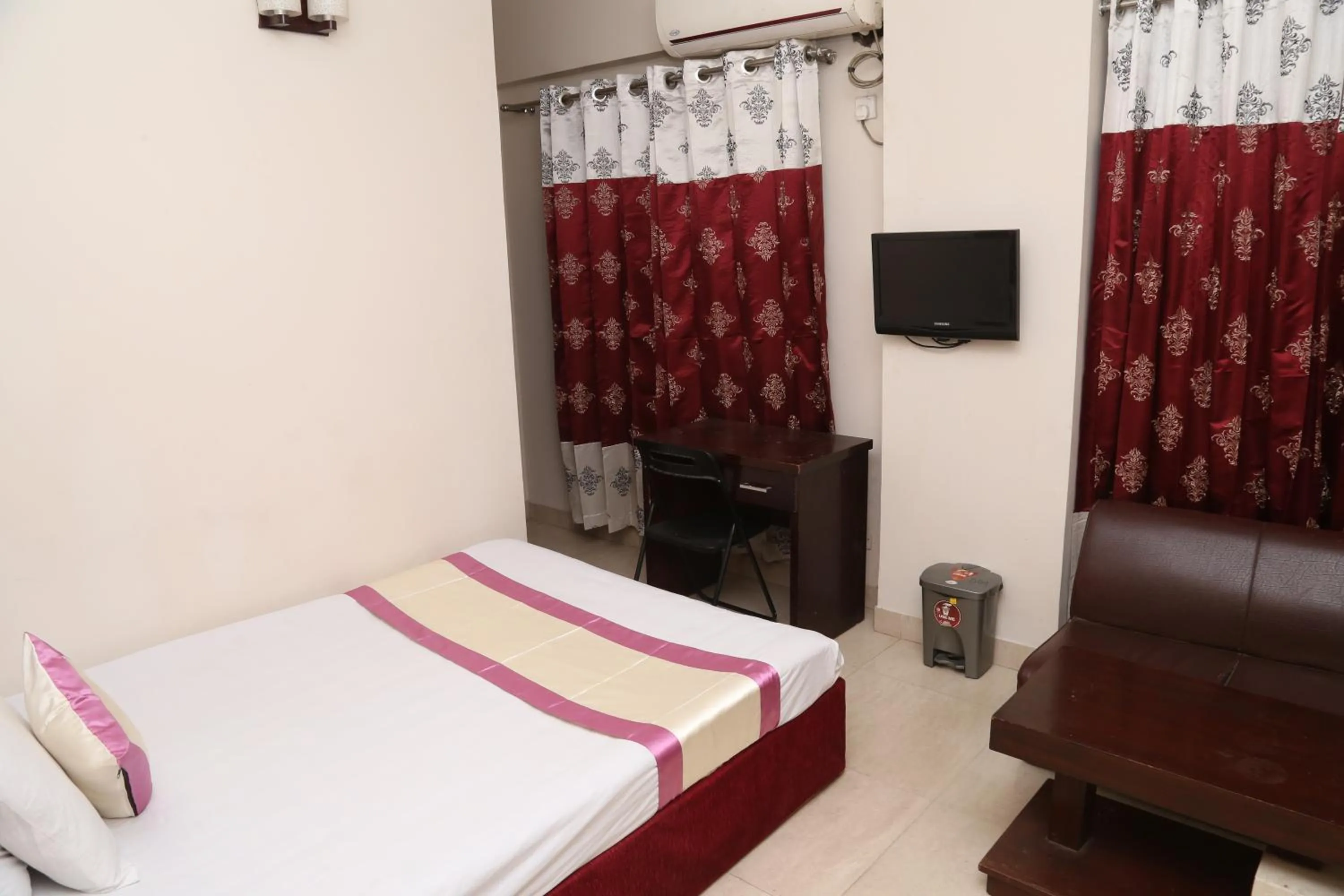 Bed in Platinum Hotel Ltd