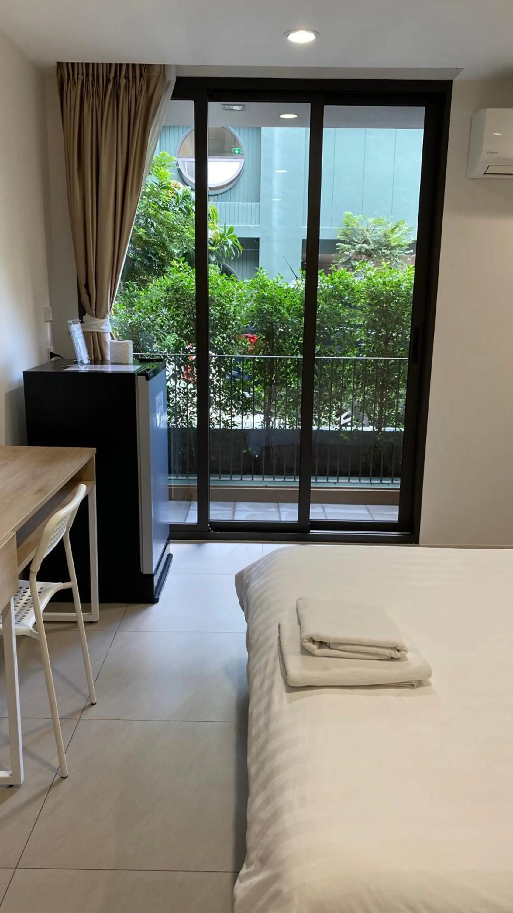 Bed in POP Heritage Residence