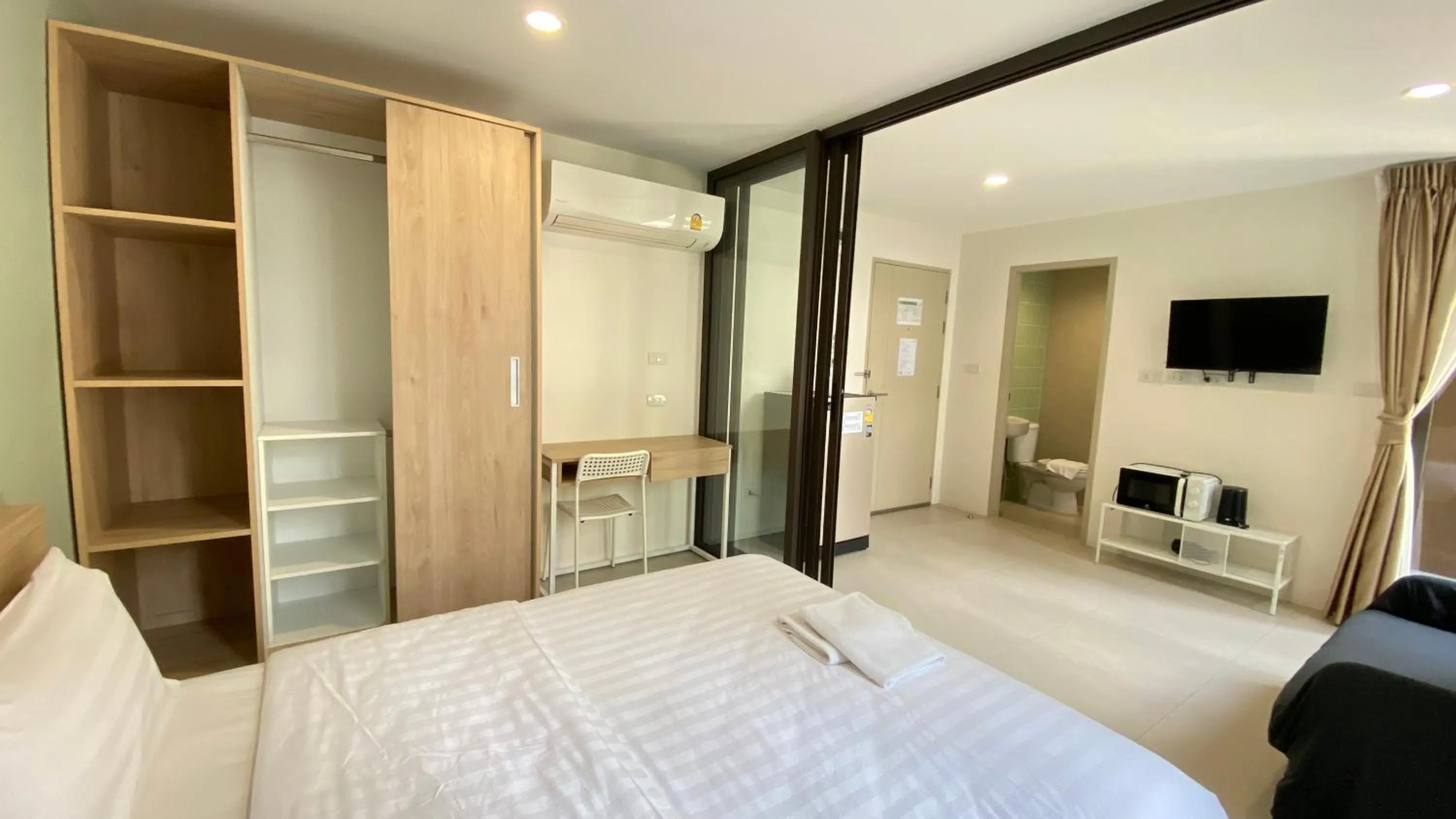 Bed in POP Heritage Residence