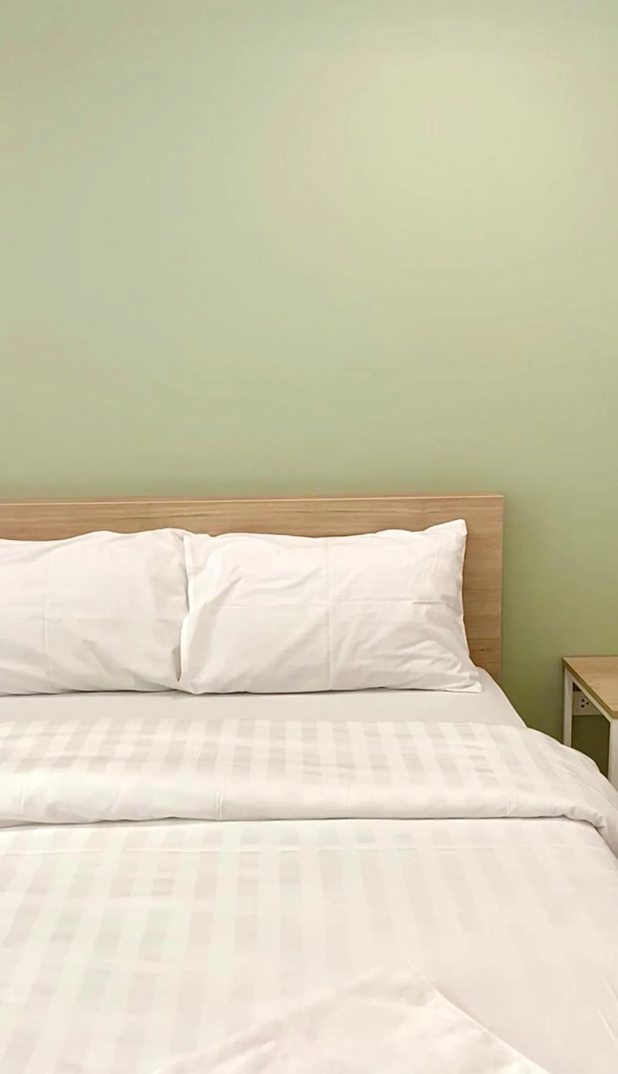 Bed in POP Heritage Residence