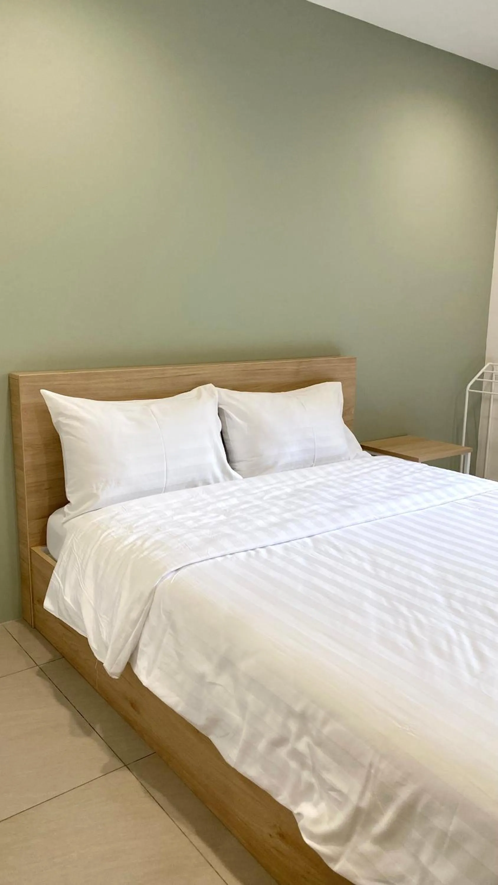 Bed in POP Heritage Residence