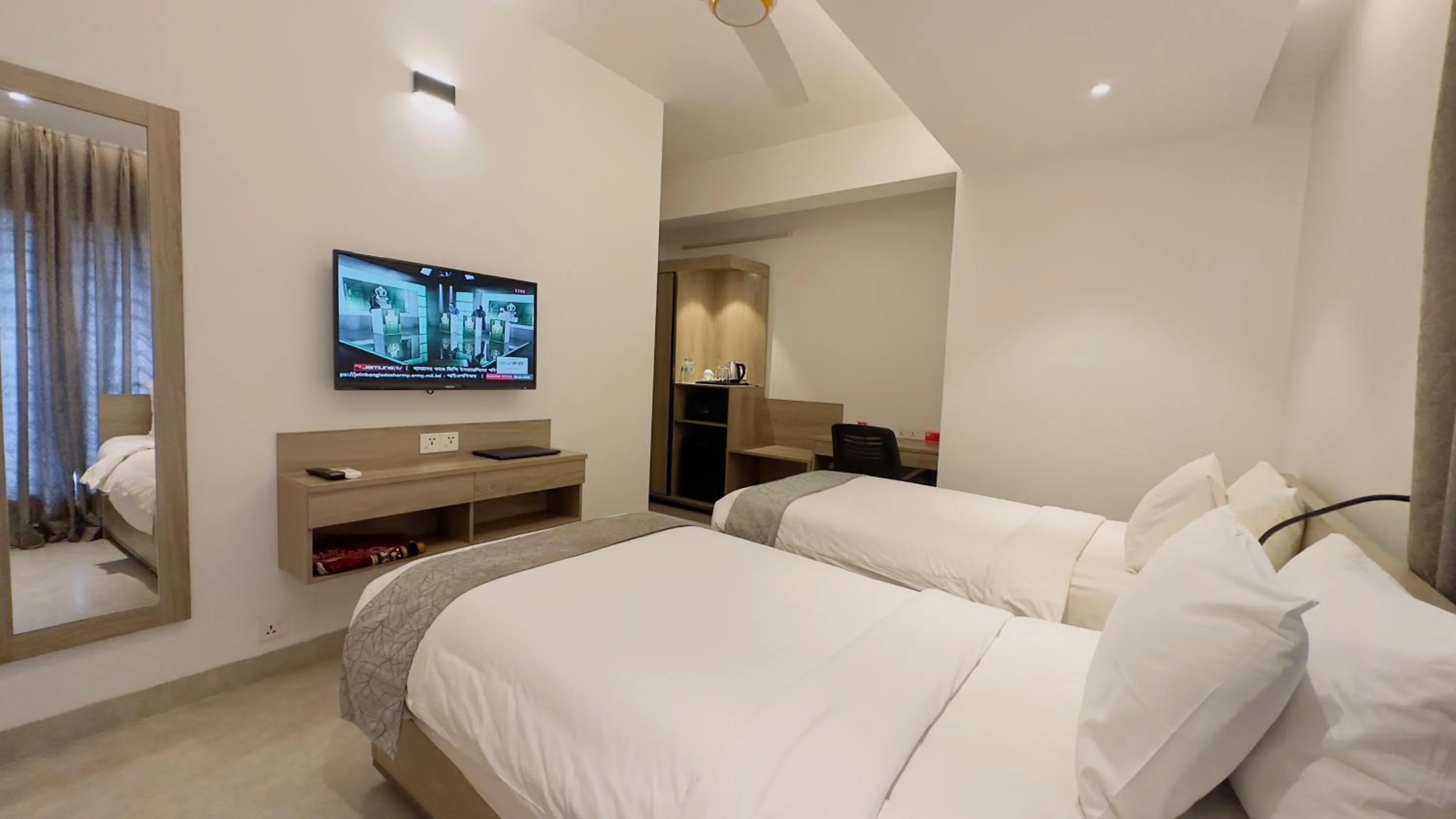 Bed in Priyo Nibash Stylish Residential Hotel