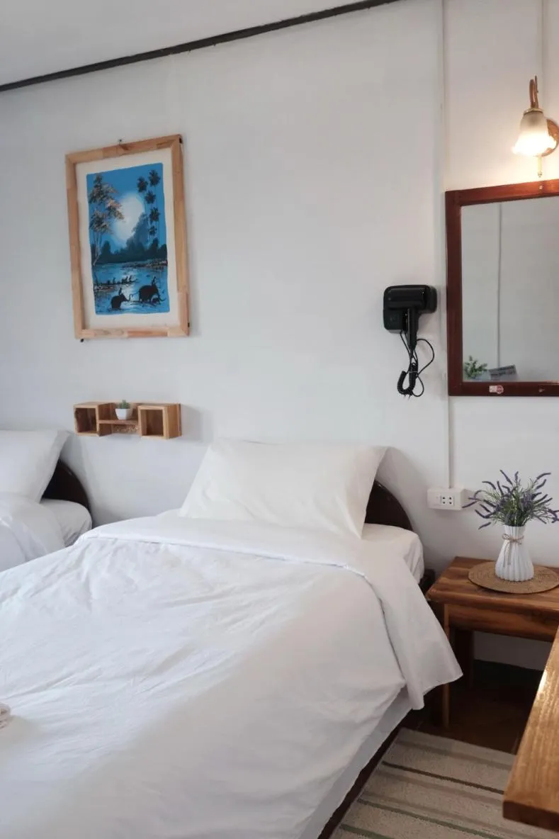 Bed in Sabaydee Guesthouse