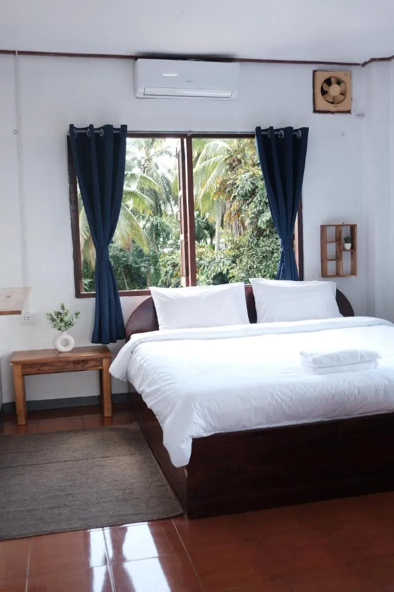 Bed in Sabaydee Guesthouse