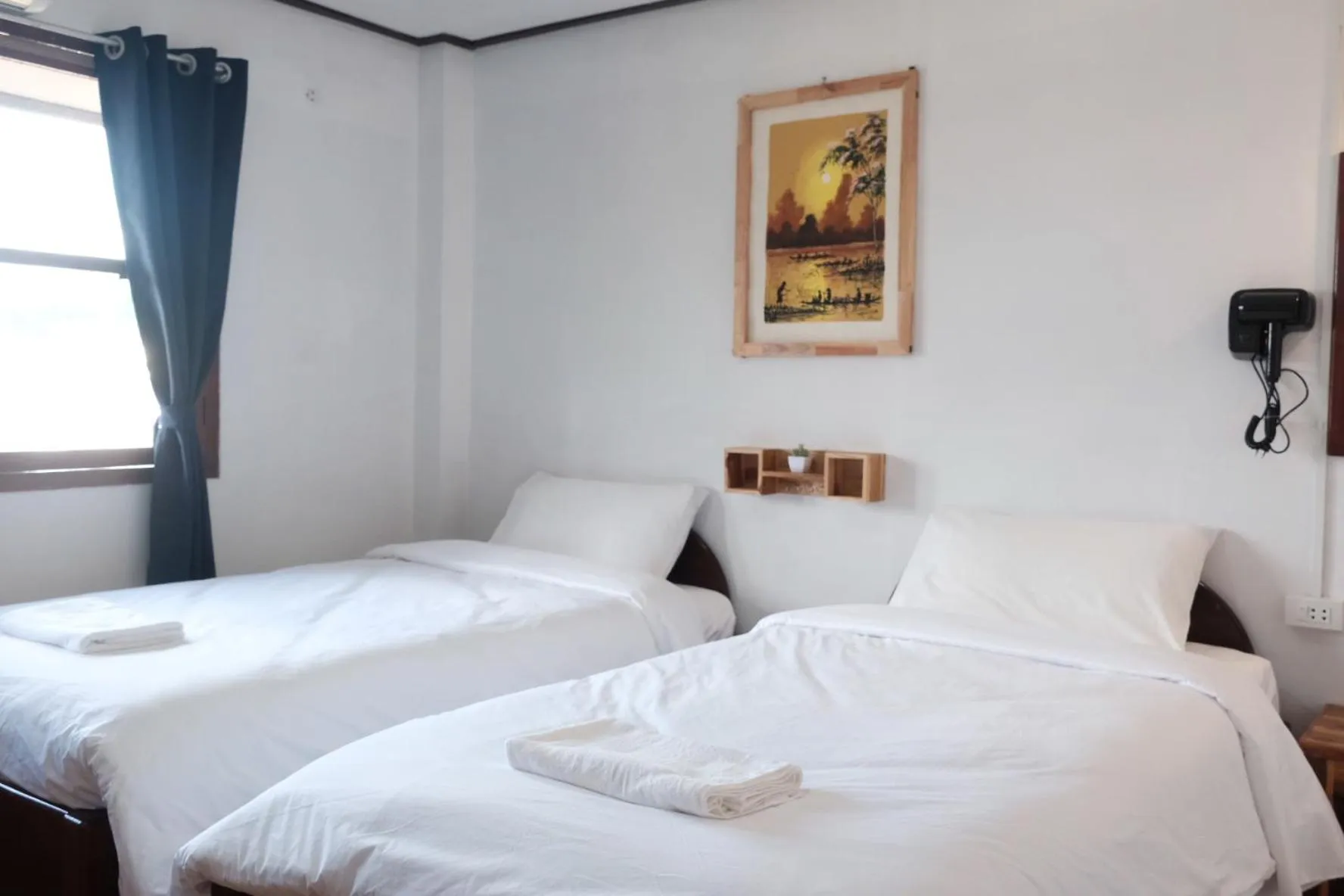 Bed in Sabaydee Guesthouse