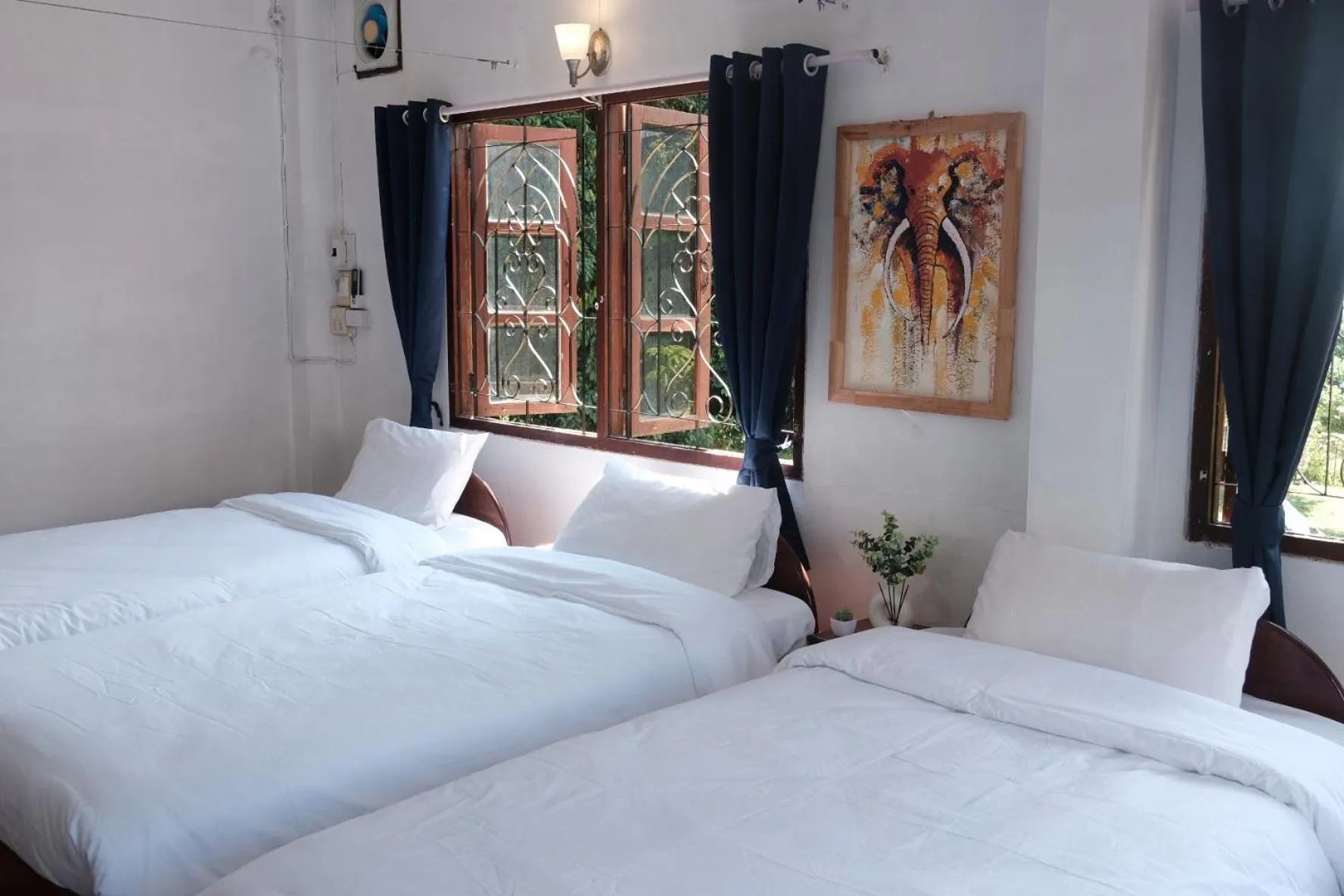 Bed in Sabaydee Guesthouse