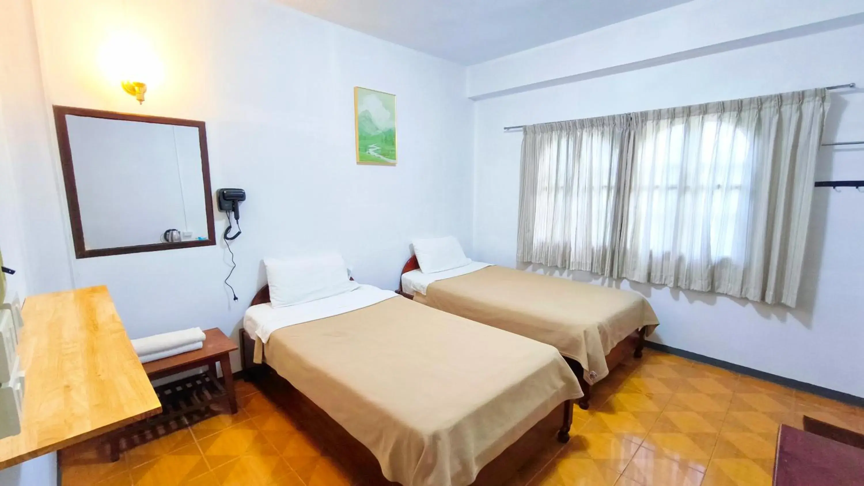 Twin Room in Sabaydee Guesthouse Twin Room in Sabaydee Guesthouse