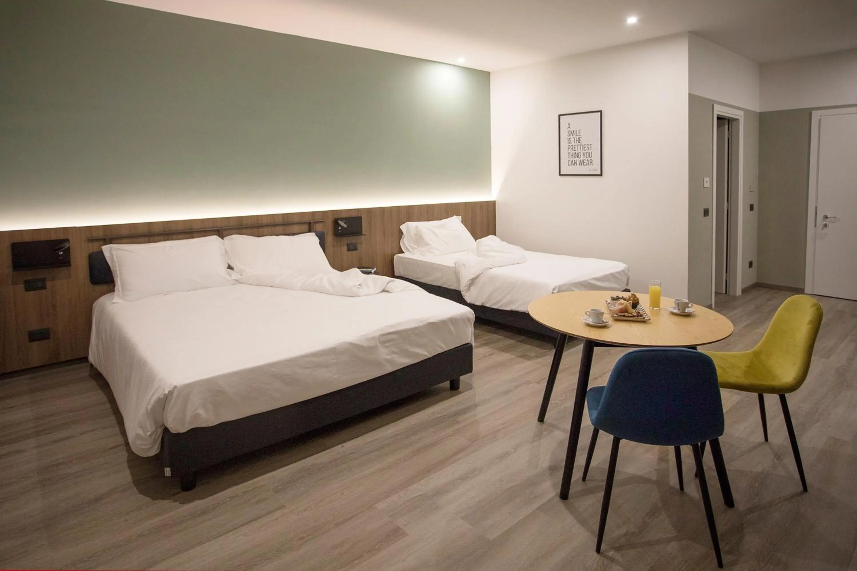 Bed in Moody smart & comfy Hotel