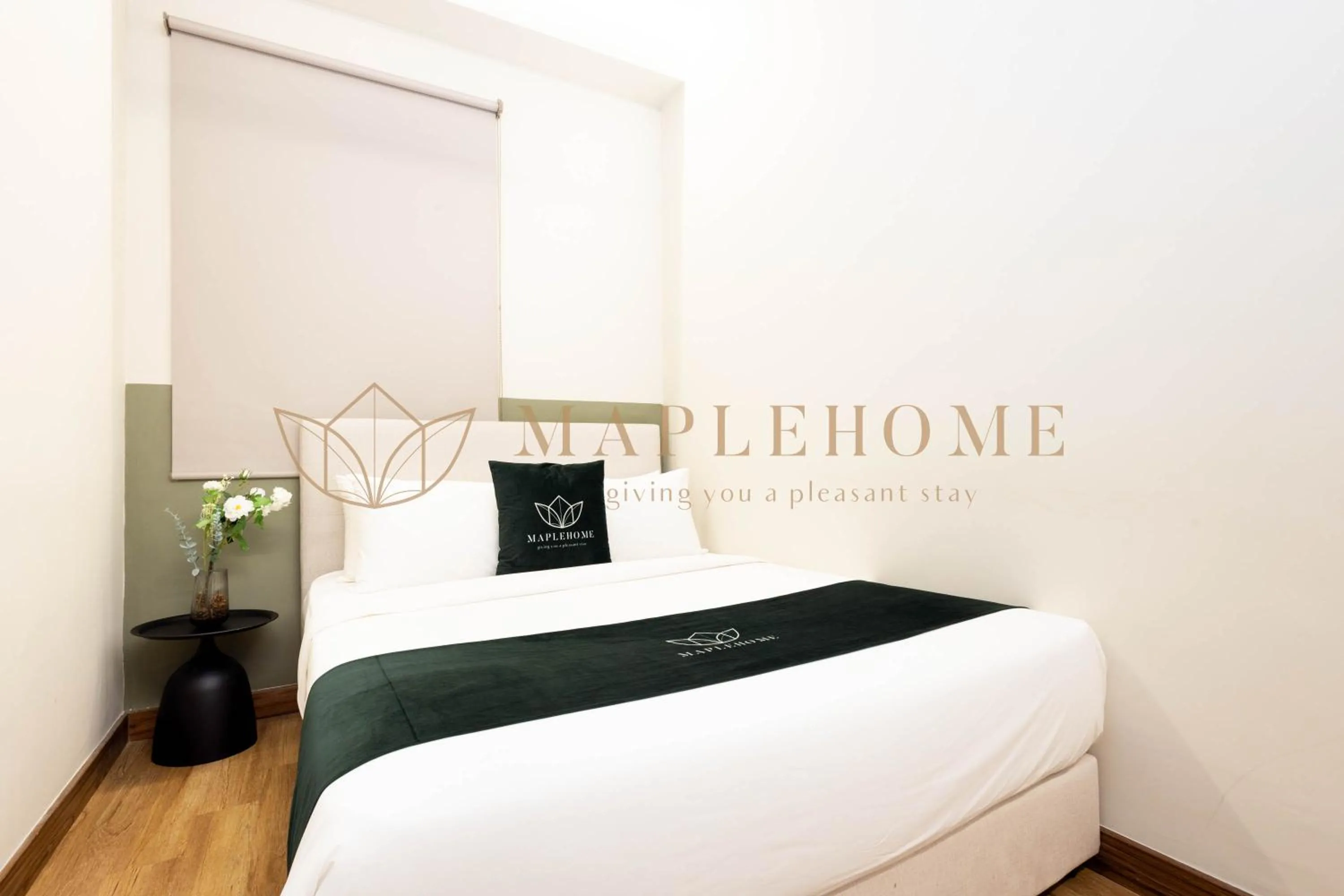 Bed in The Apple Premier Suites Melaka