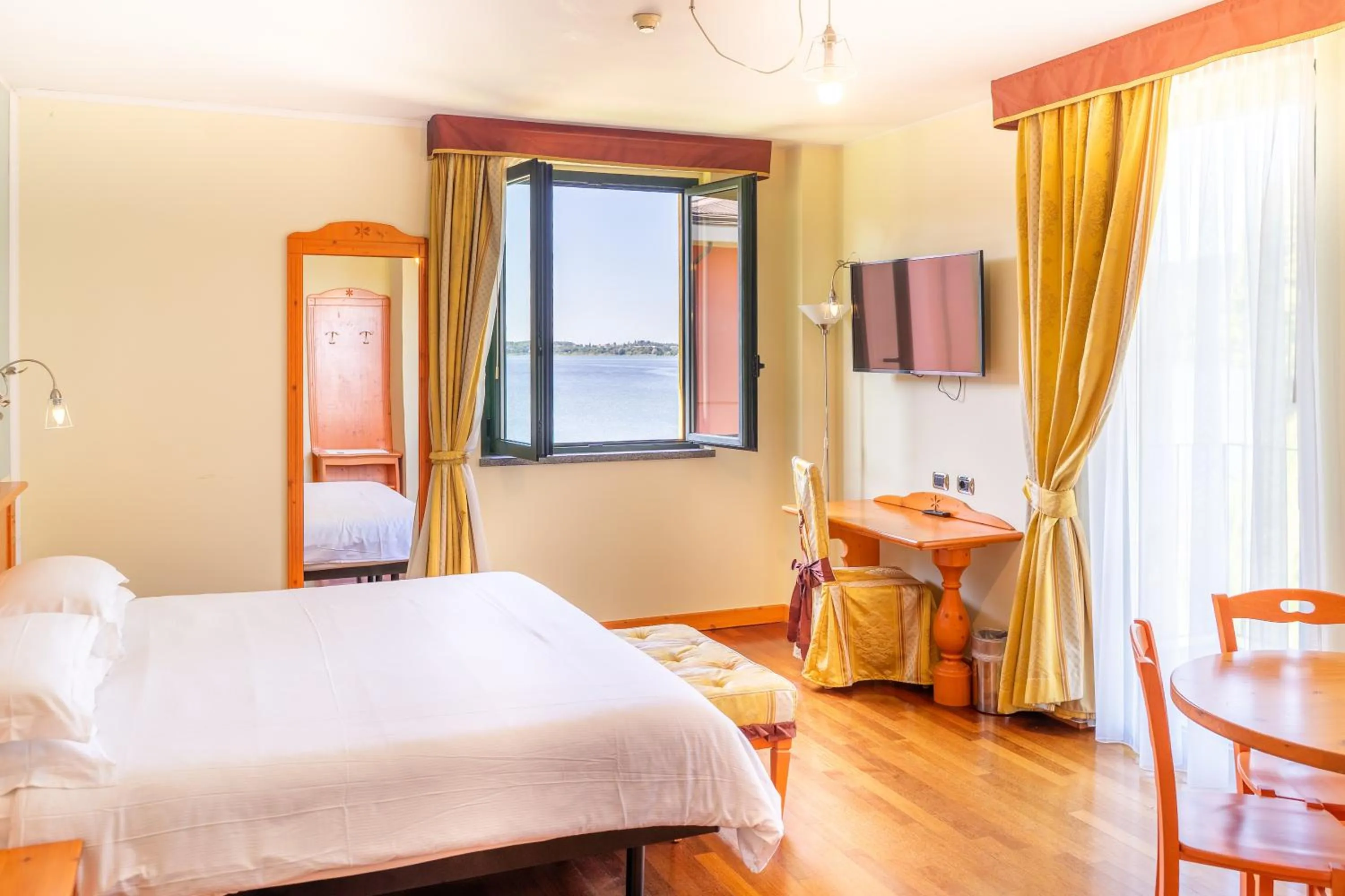 Bed in Hotel Residence Montelago