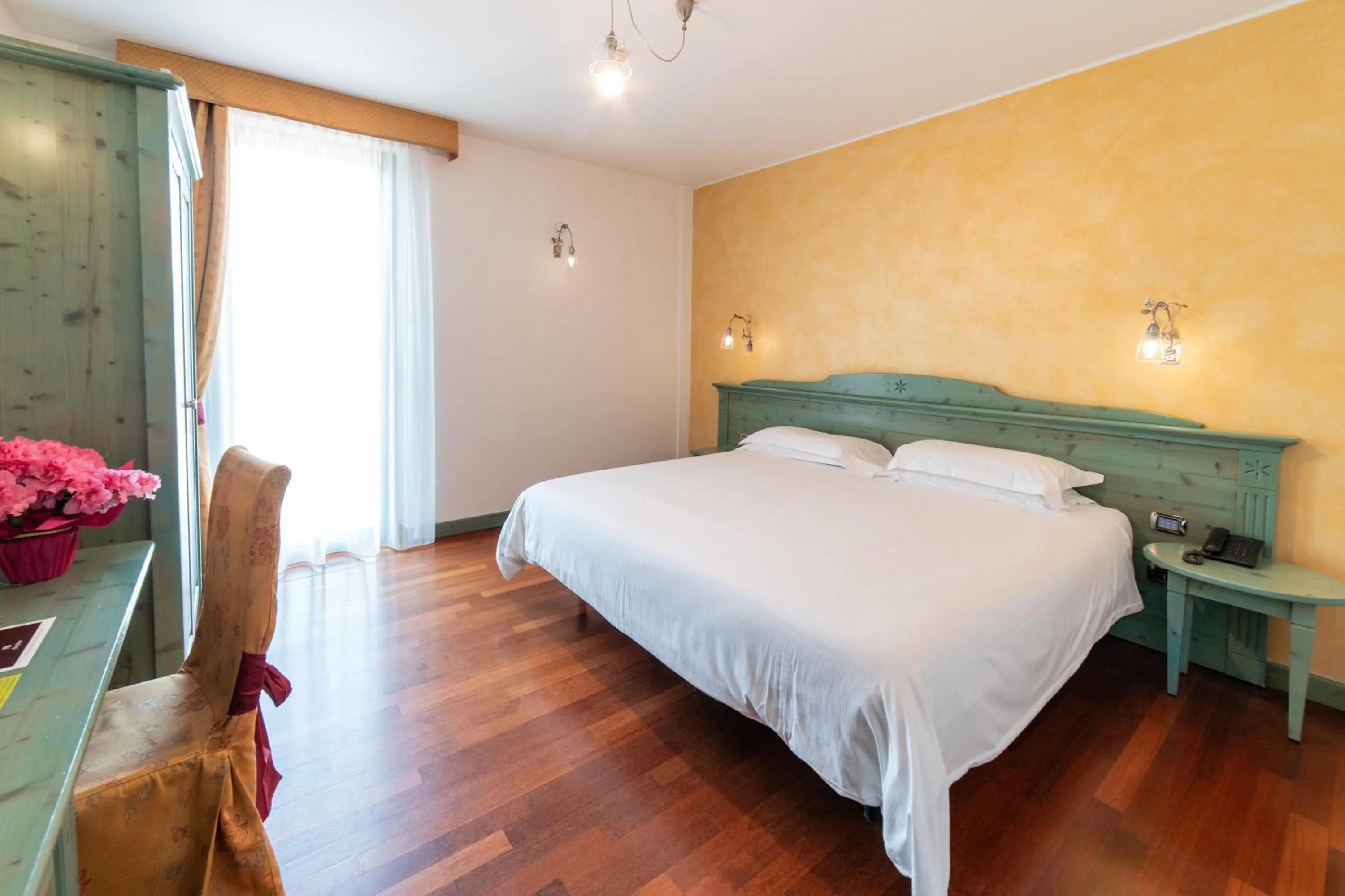 Bed in Hotel Residence Montelago