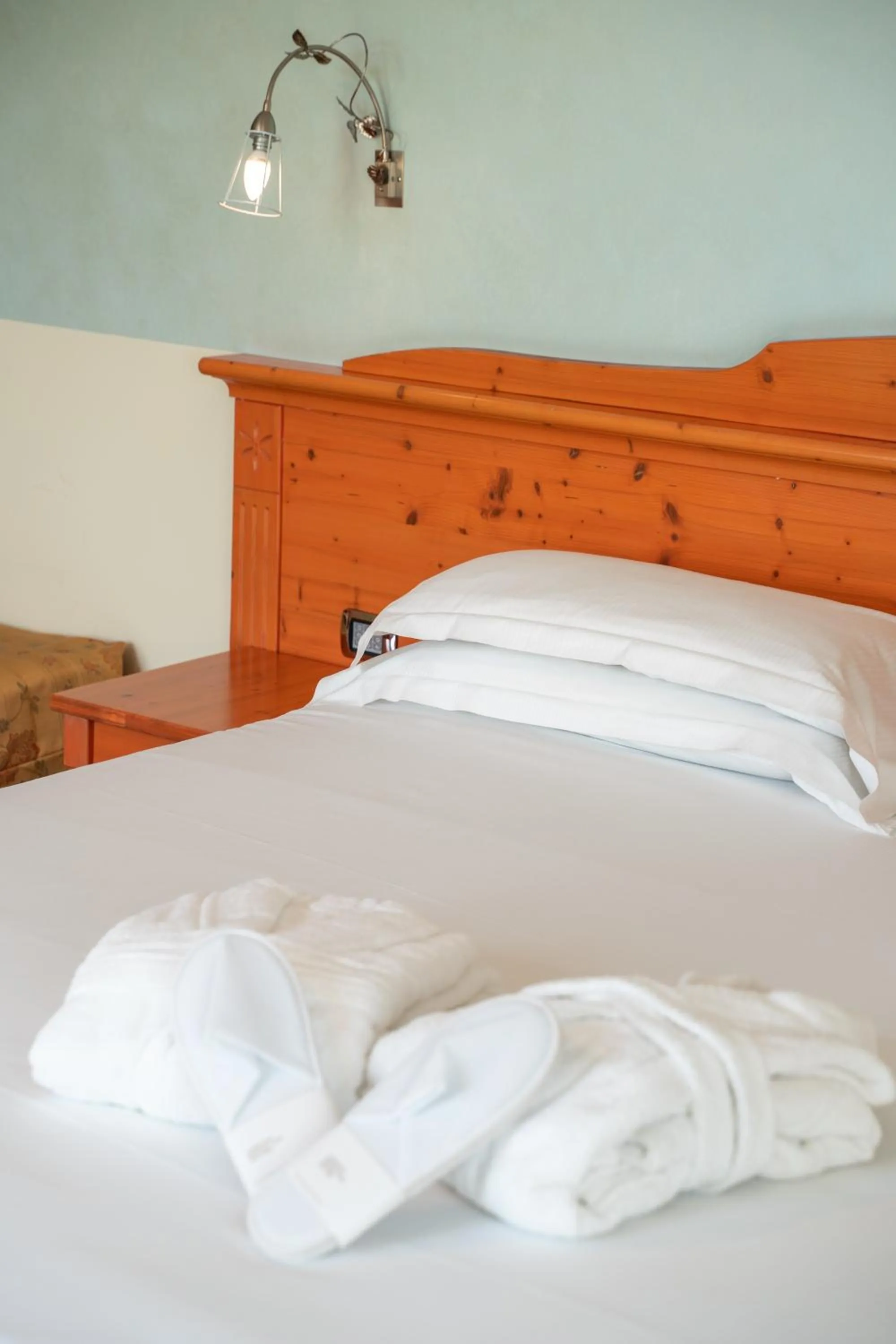 Bed in Hotel Residence Montelago