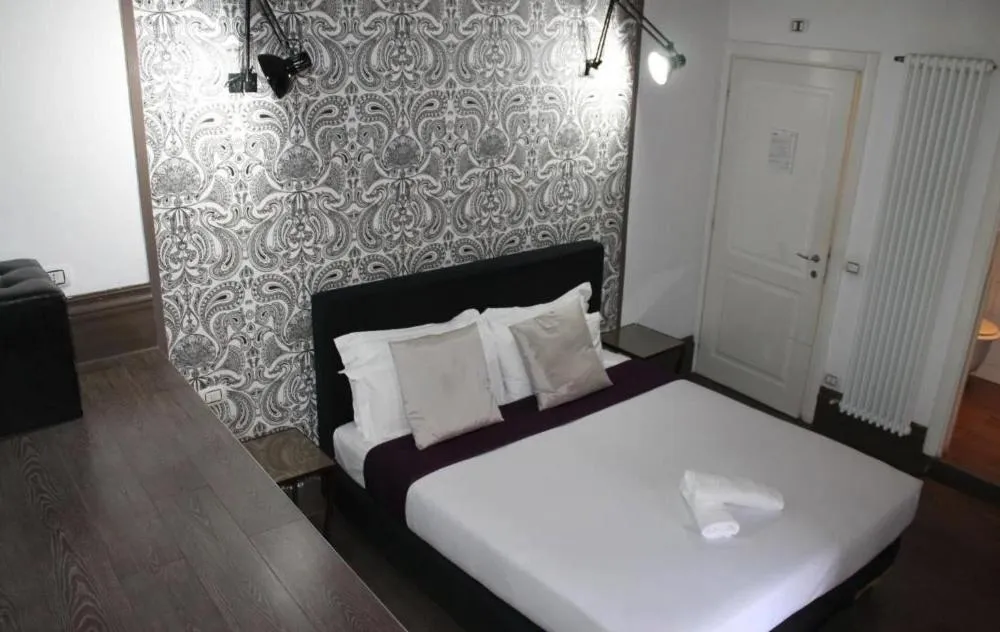 Bed in Locanda degli Antiquari