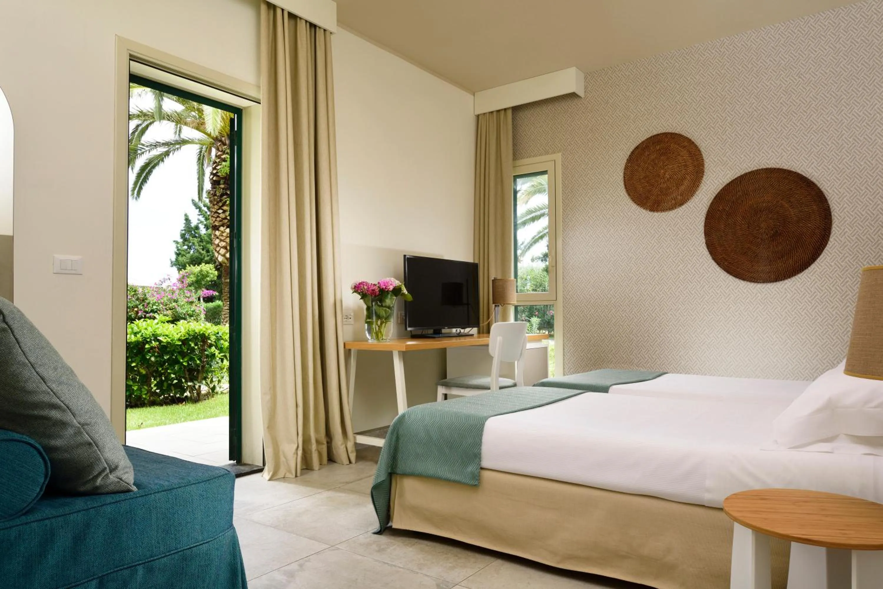 Bed in UNA Hotels Naxos Beach Sicilia