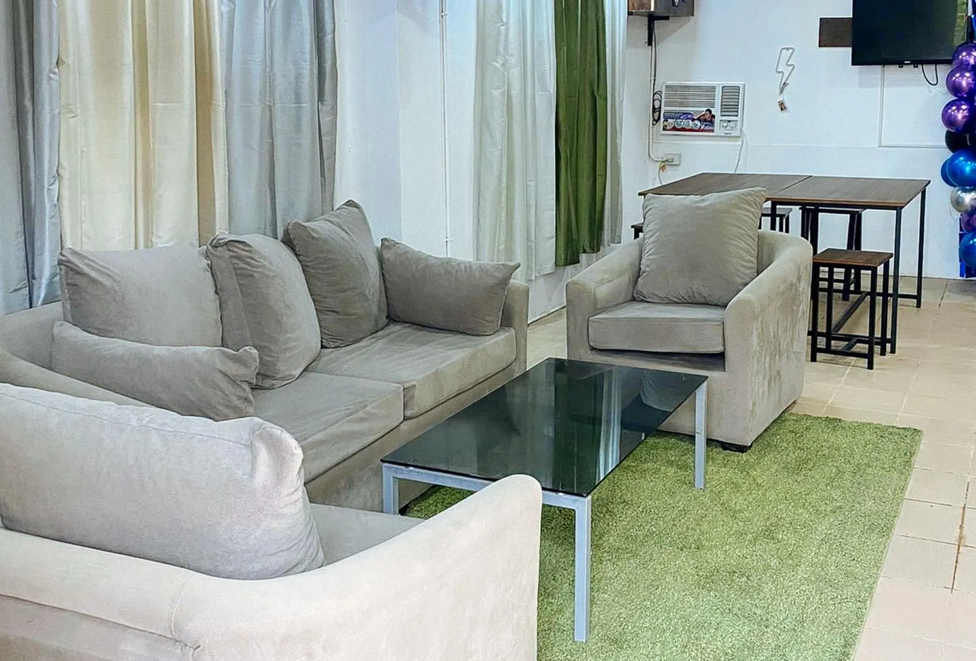 Seating area in UrbanView at Balzain East Tuguegarao City by RedDoorz