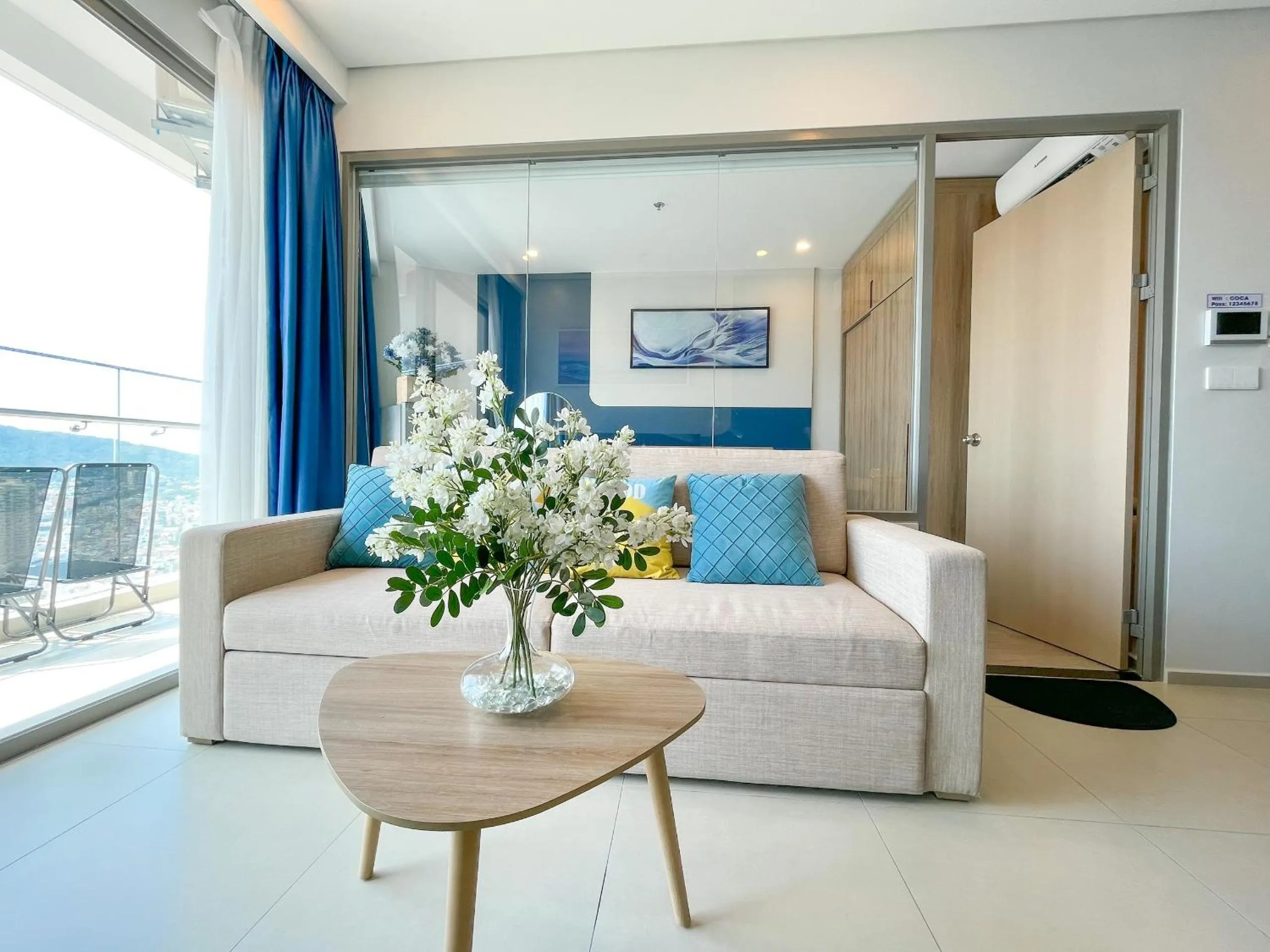 Living room, Bed in The Sóng Apartment Vũng Tàu - Mita House