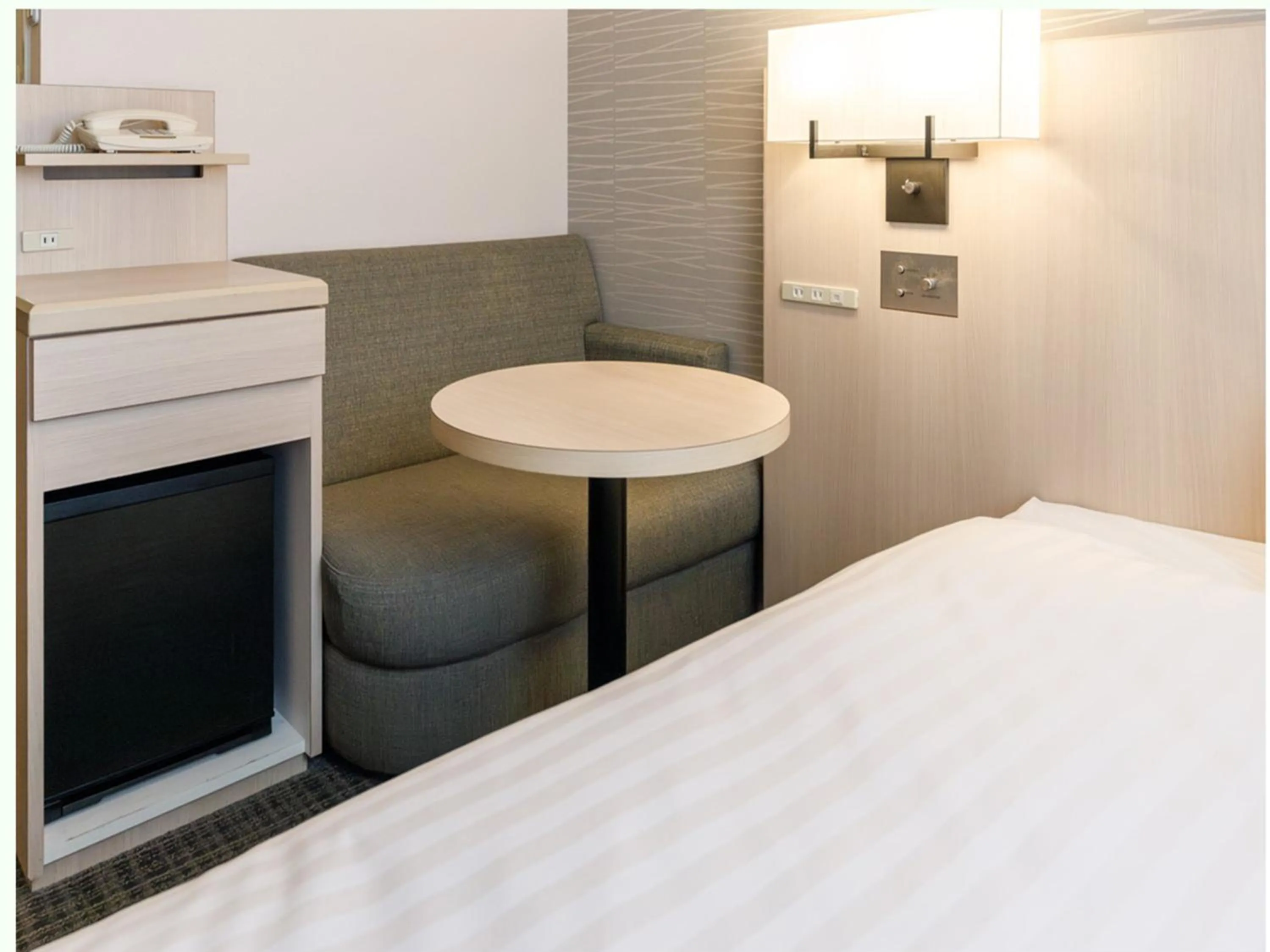 Photo of the whole room, Bed in Nishitetsu Resort Inn Beppu