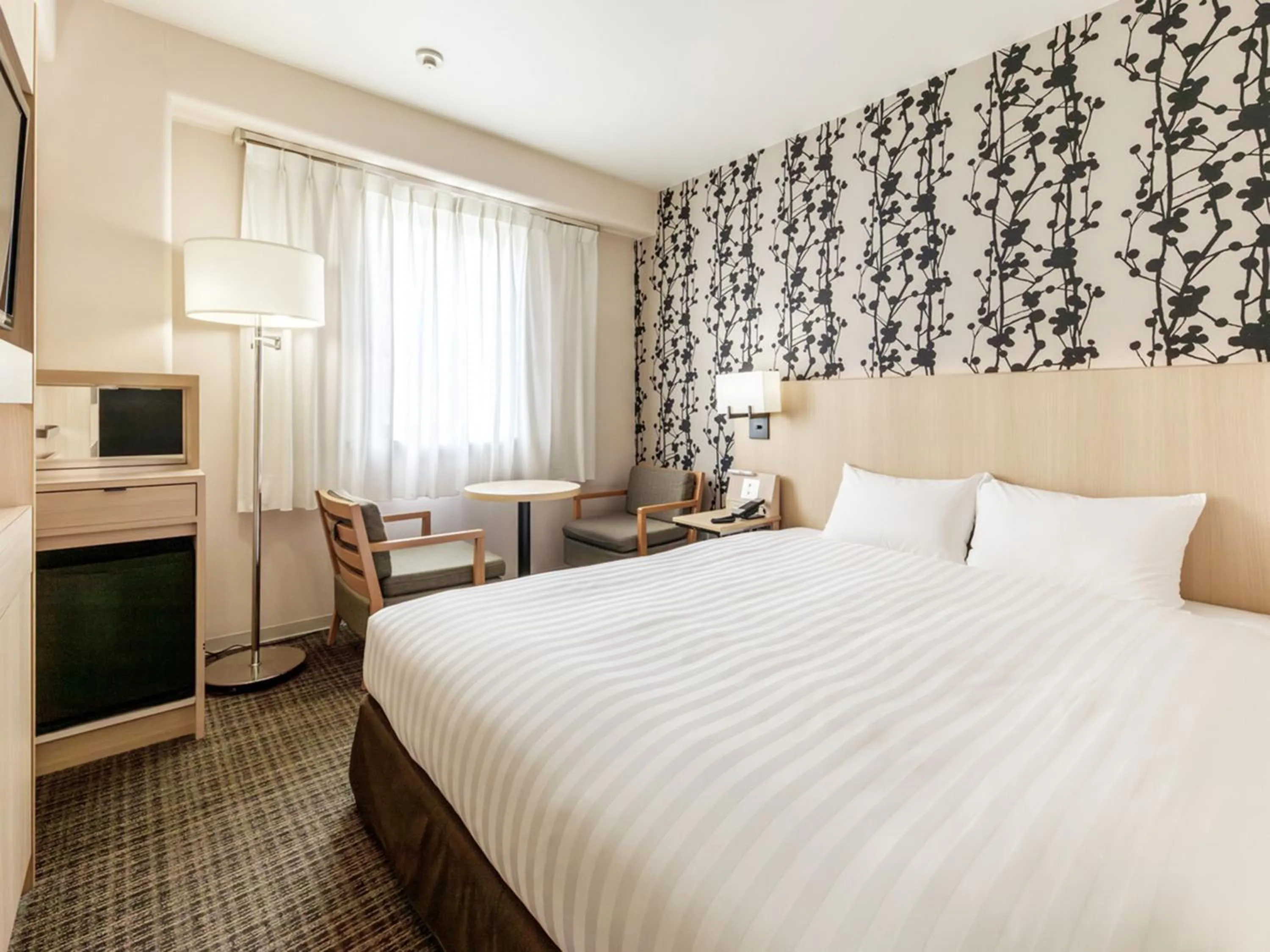 Photo of the whole room, Bed in Nishitetsu Resort Inn Beppu