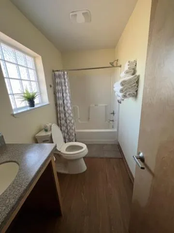 Toilet in Ponderosa Gardens Motel