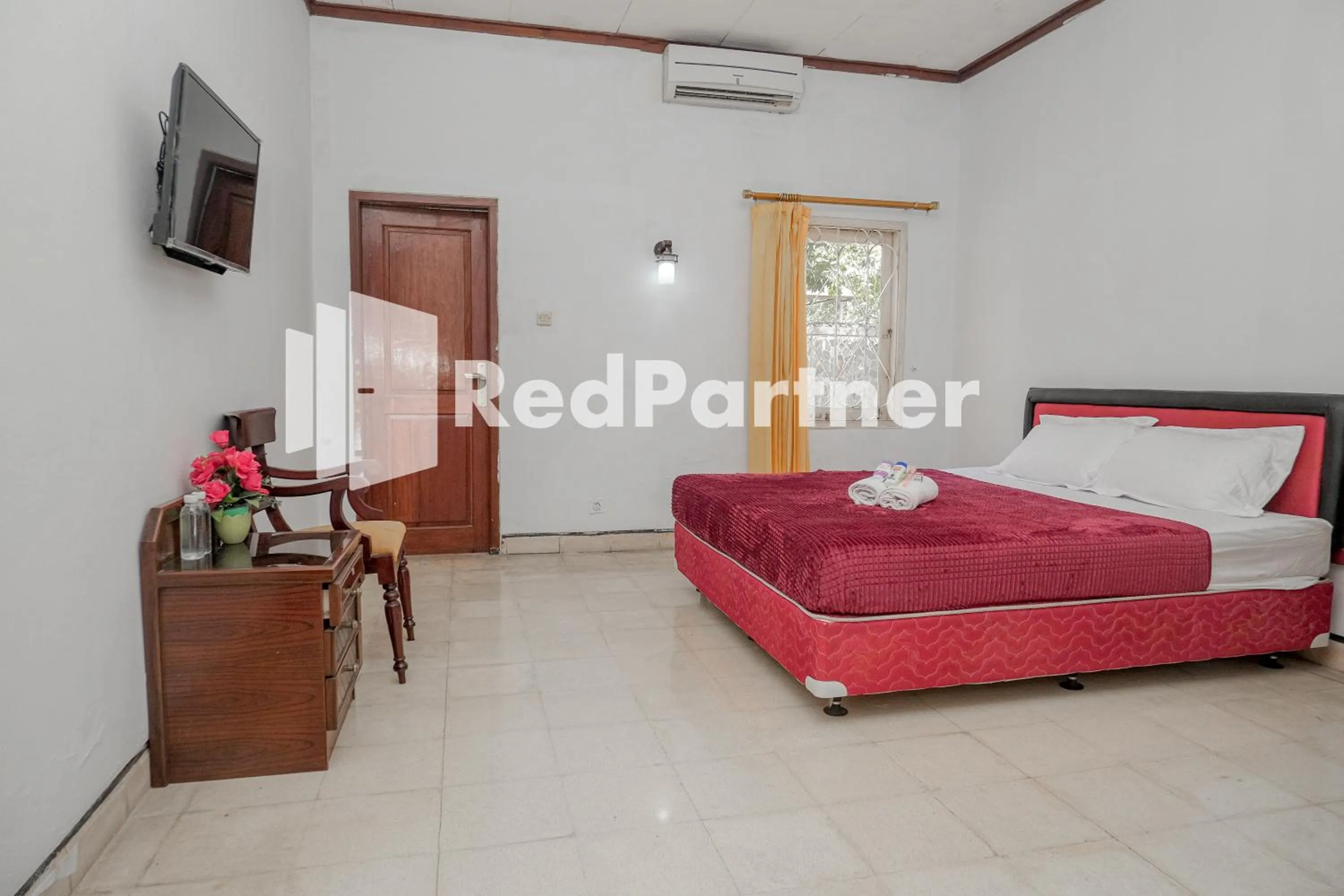 Bedroom in Rajawali Guest House Mitra RedDoorz
