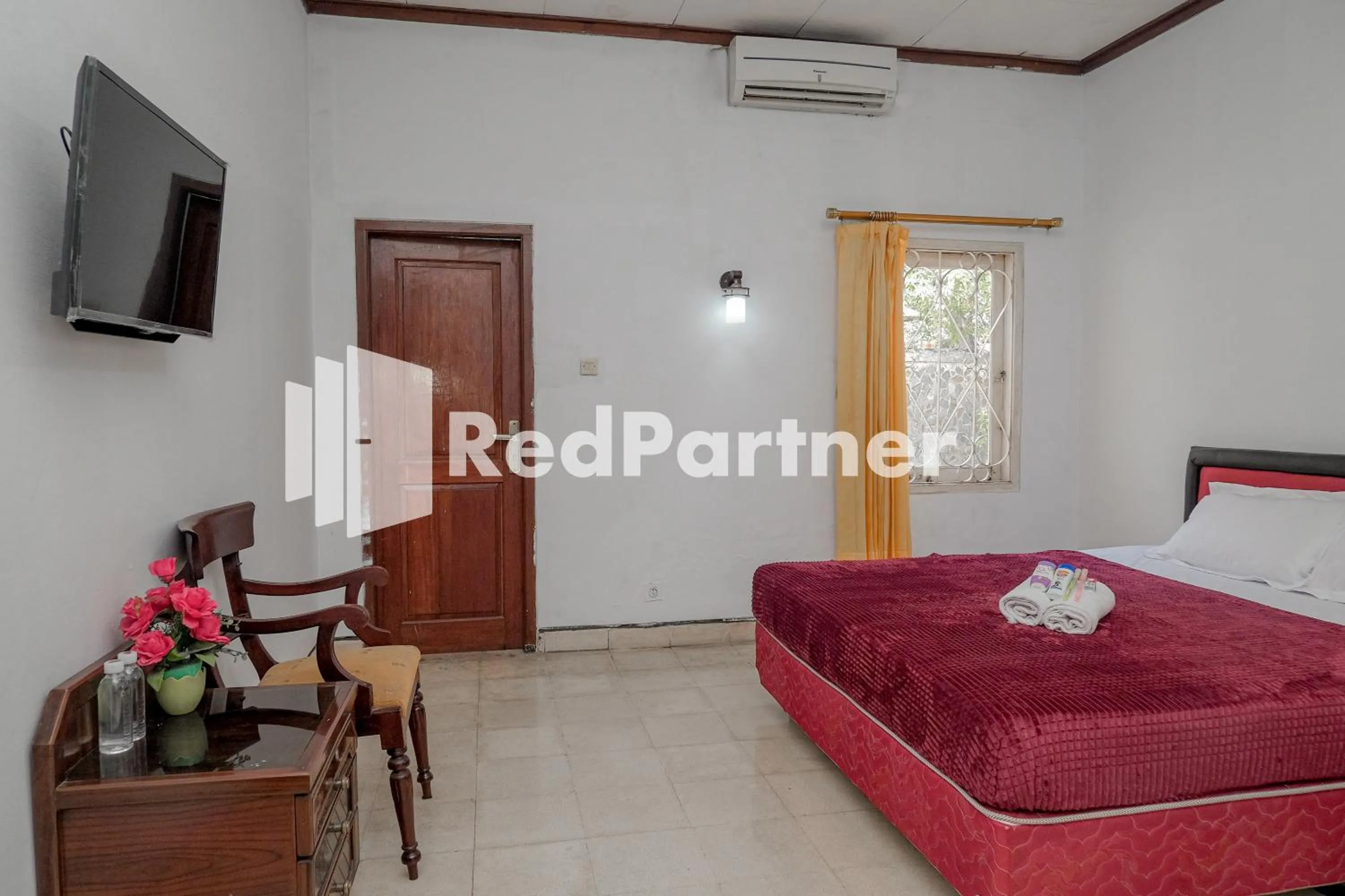 Bedroom in Rajawali Guest House Mitra RedDoorz