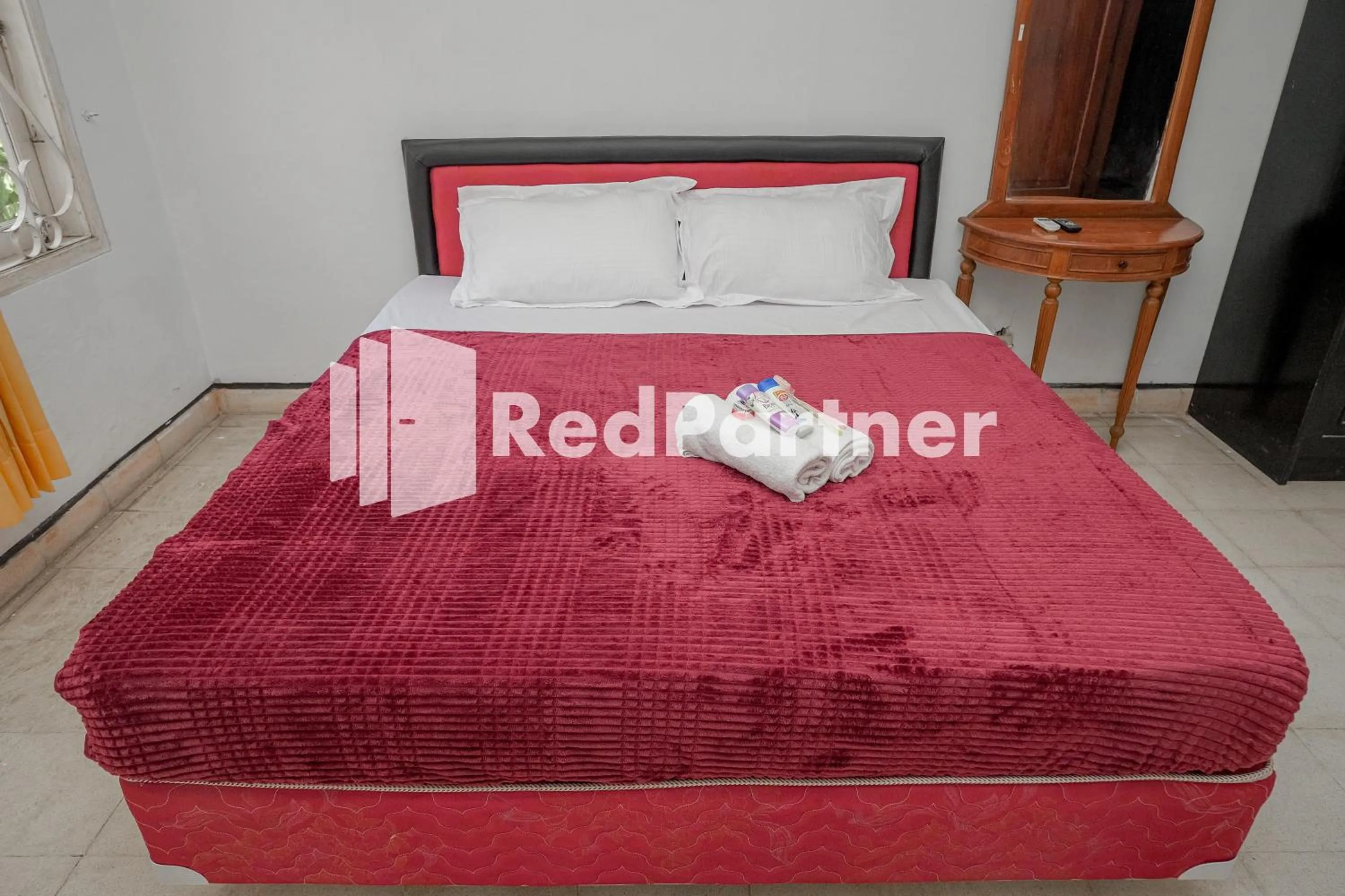 Bedroom in Rajawali Guest House Mitra RedDoorz