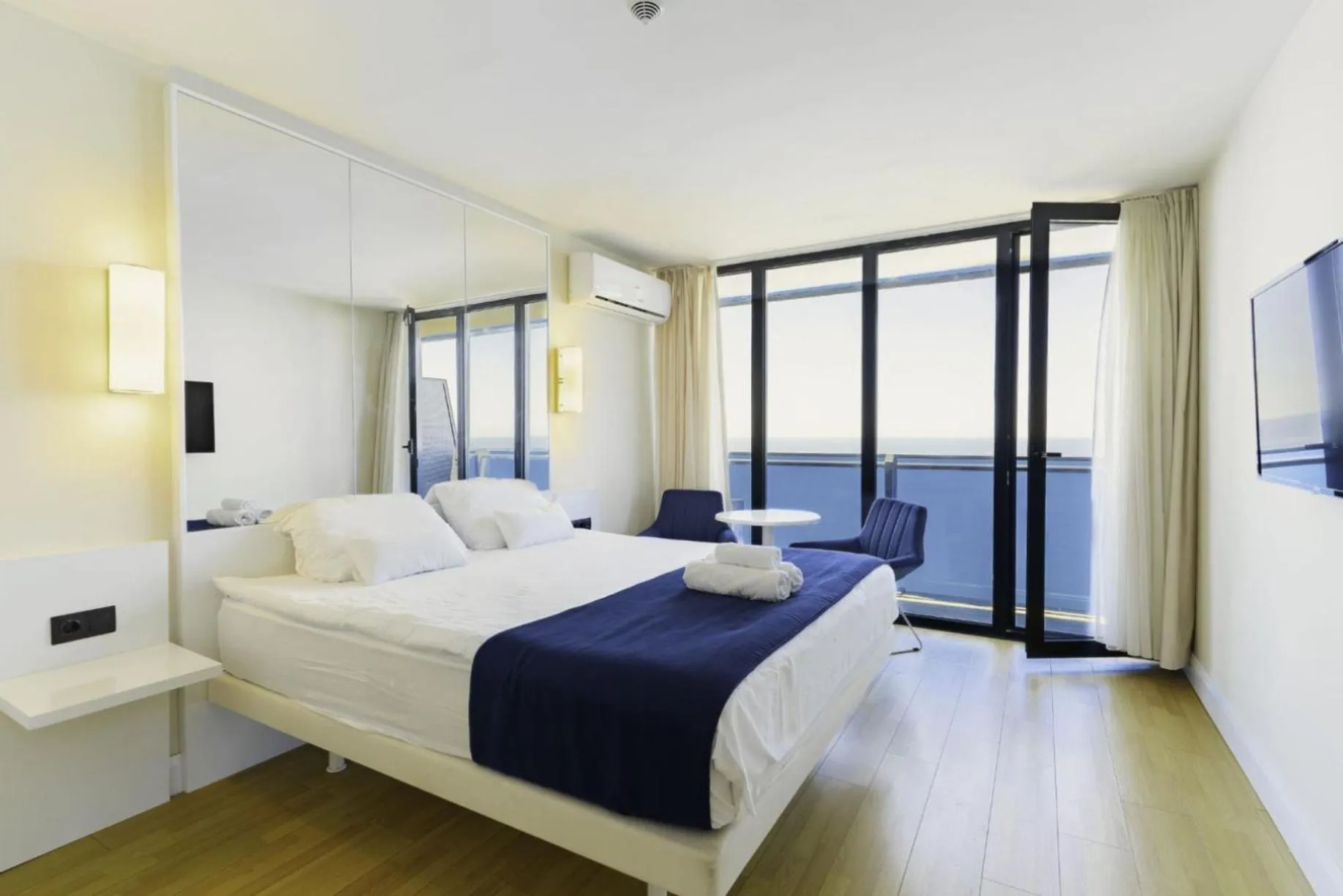 Bed in Elegance Sea View Aparthotel In Orbi City Batumi