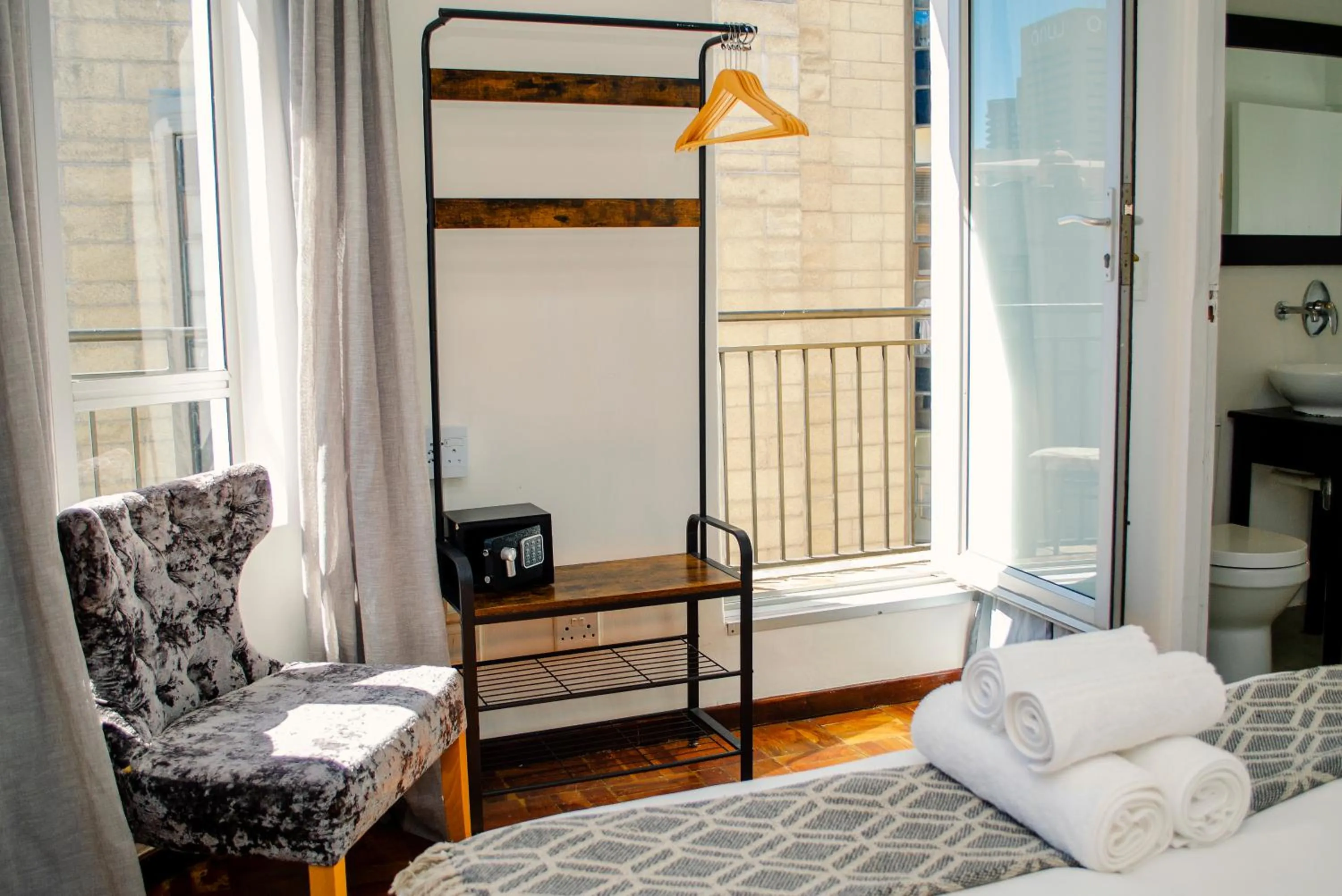 Bed in Cape Diamond Boutique Hotel