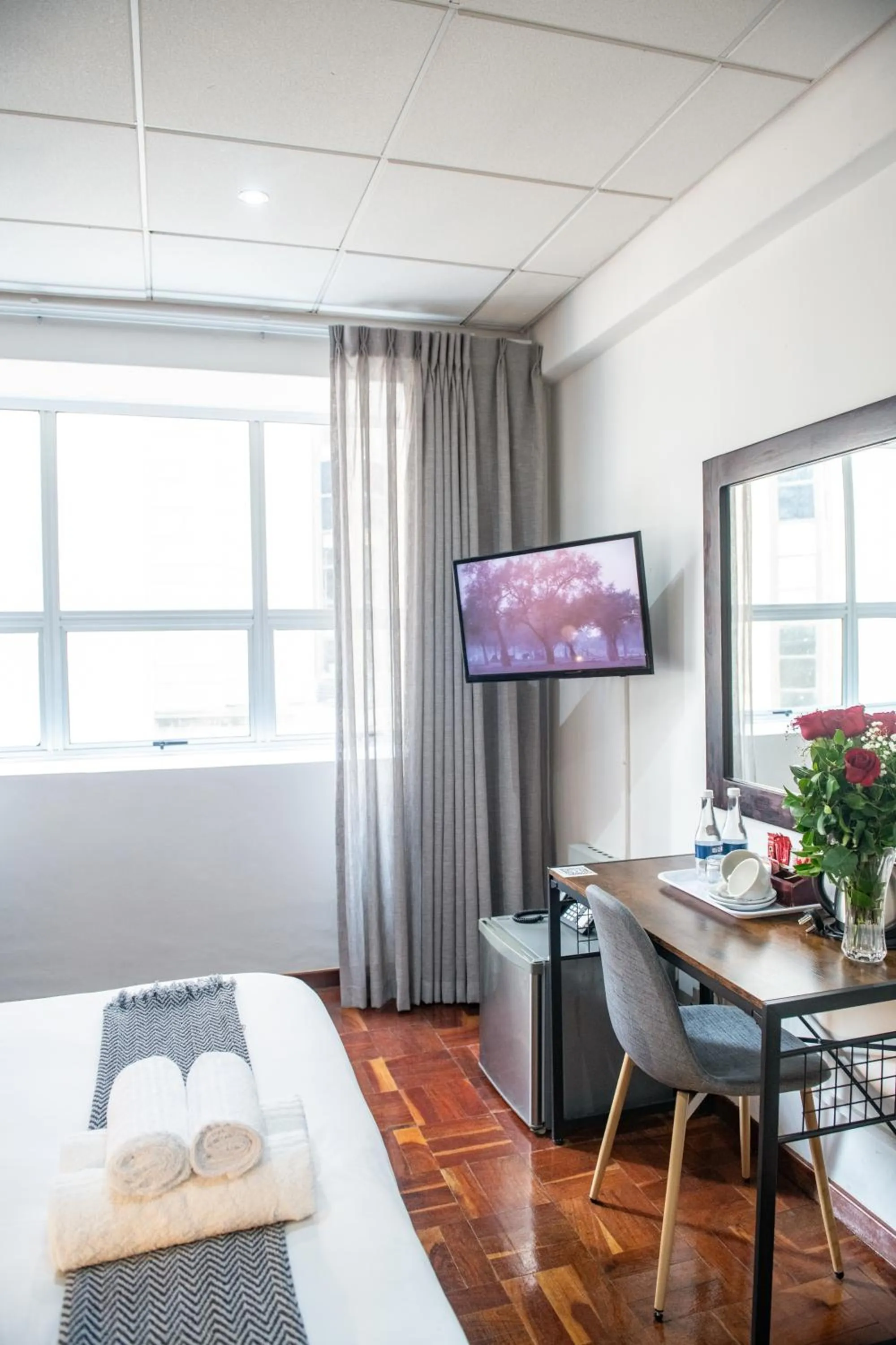 Seating area, Bed in Cape Diamond Boutique Hotel