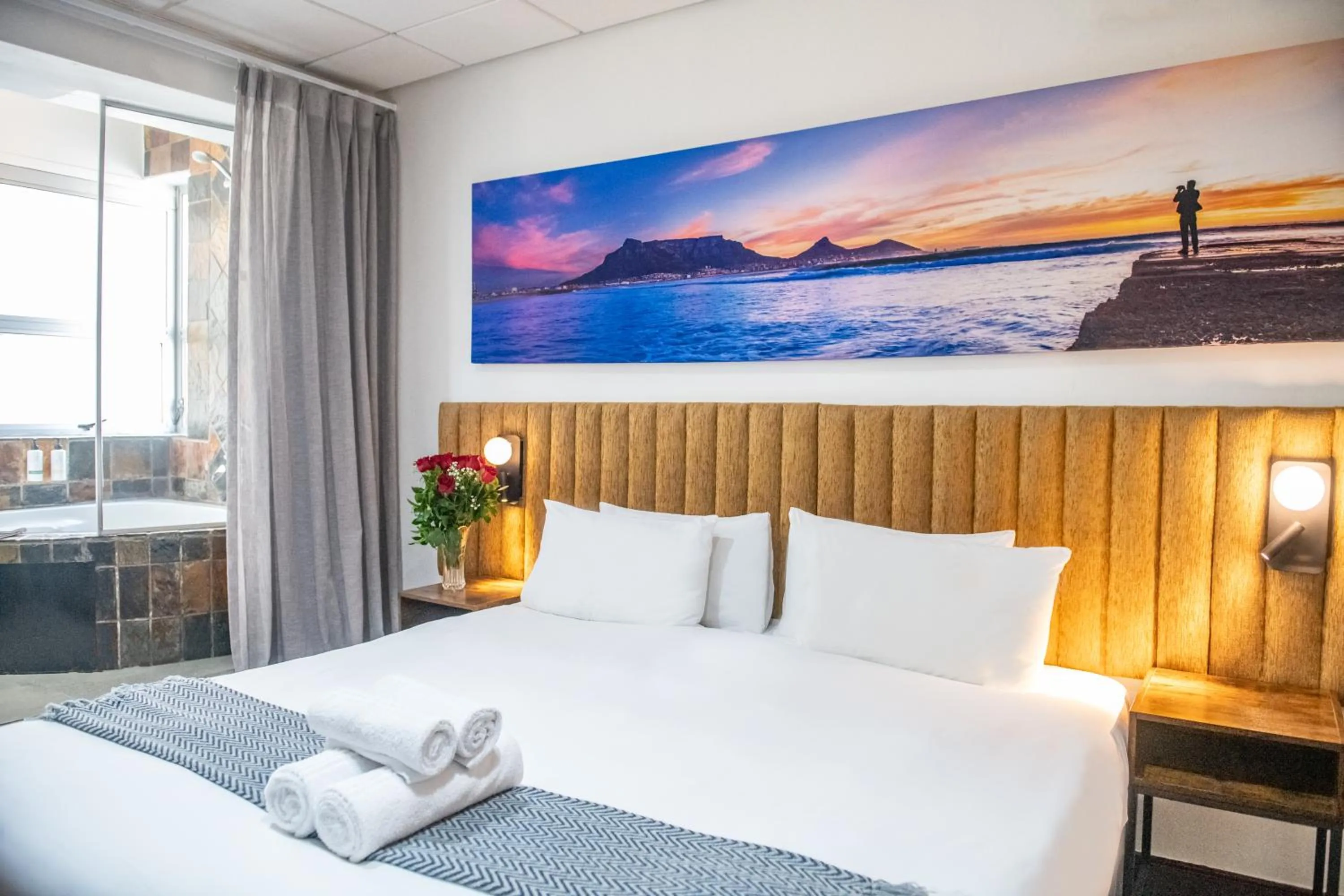 Bed in Cape Diamond Boutique Hotel