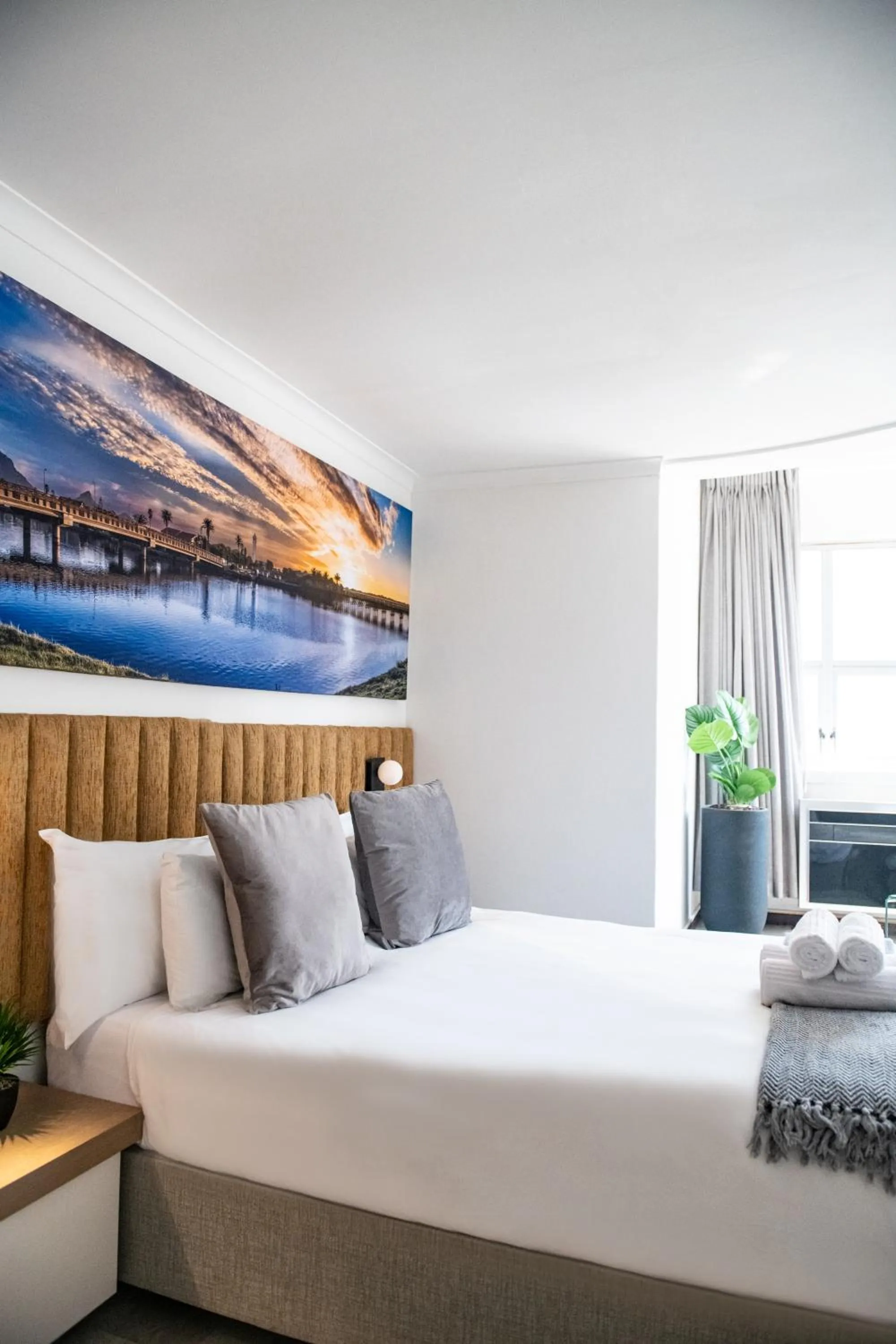 Bed in Cape Diamond Boutique Hotel