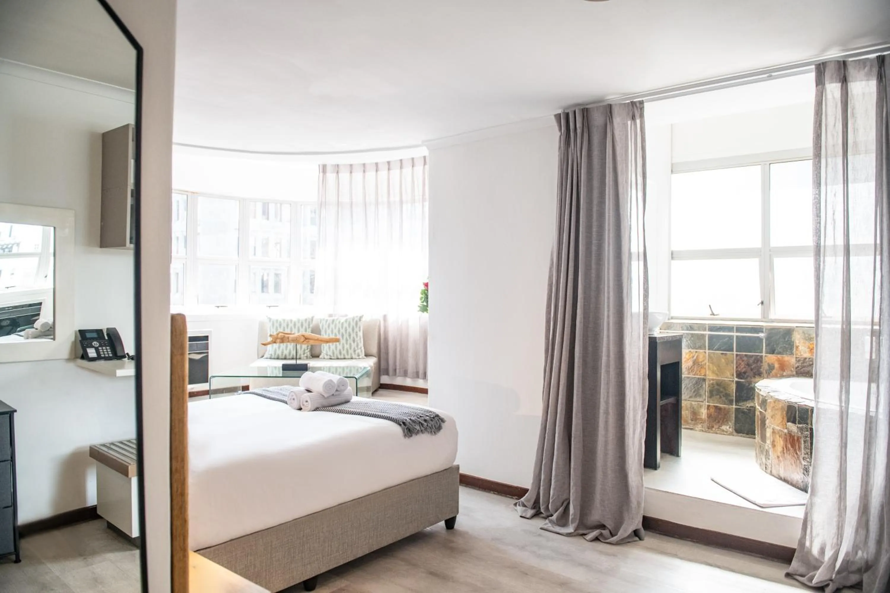 Photo of the whole room, Bed in Cape Diamond Boutique Hotel