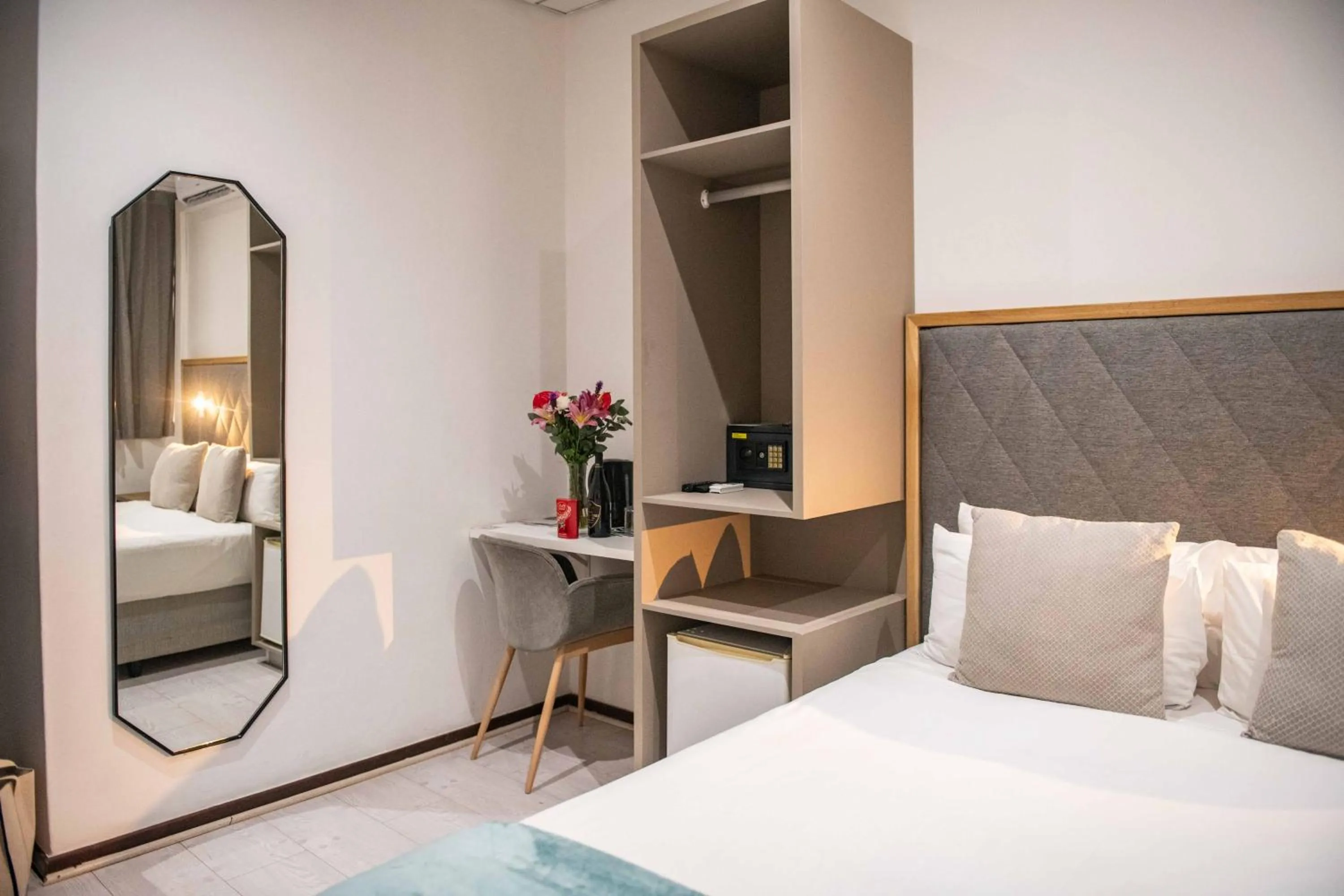 wardrobe, Bed in Cape Diamond Boutique Hotel