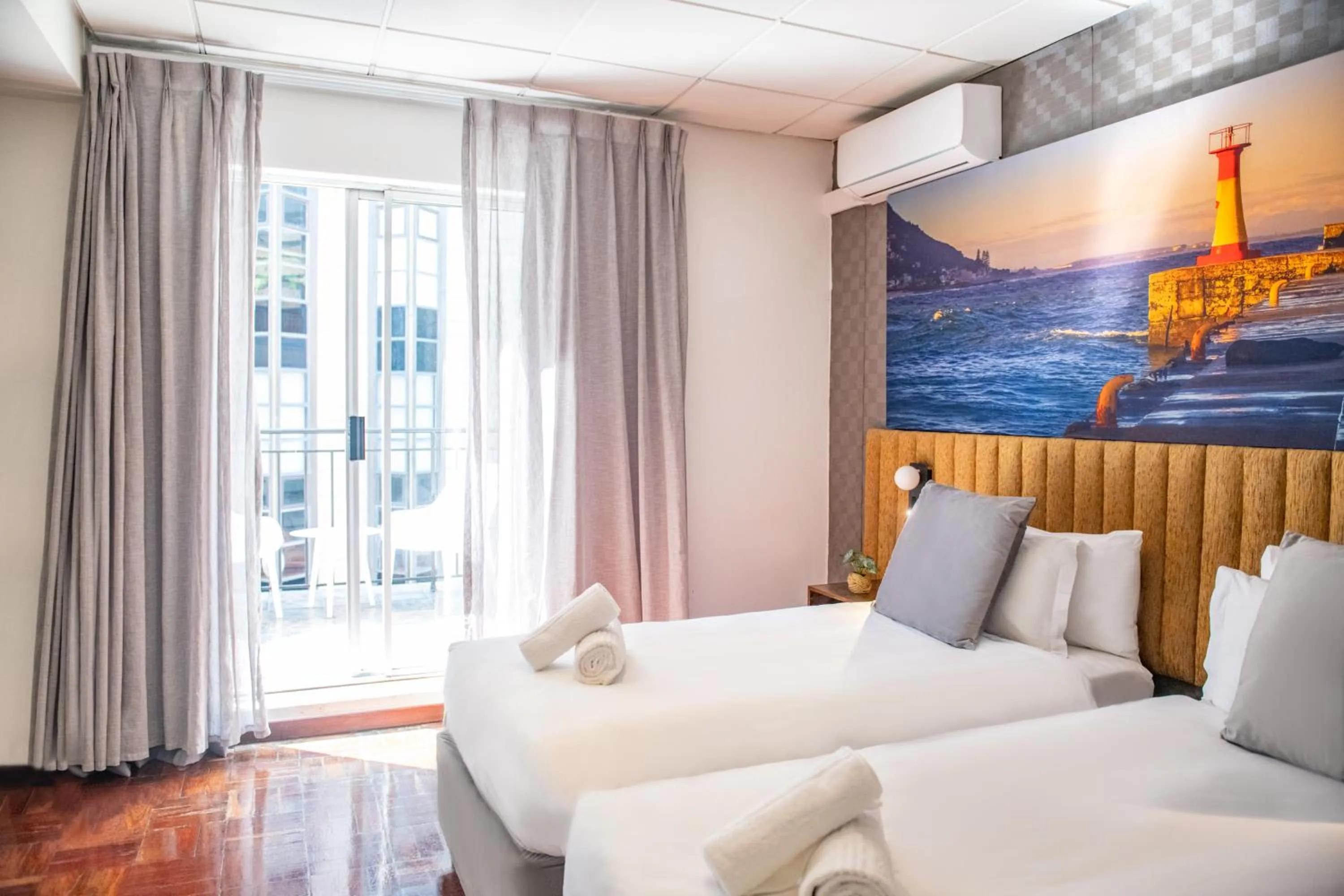 Bed in Cape Diamond Boutique Hotel