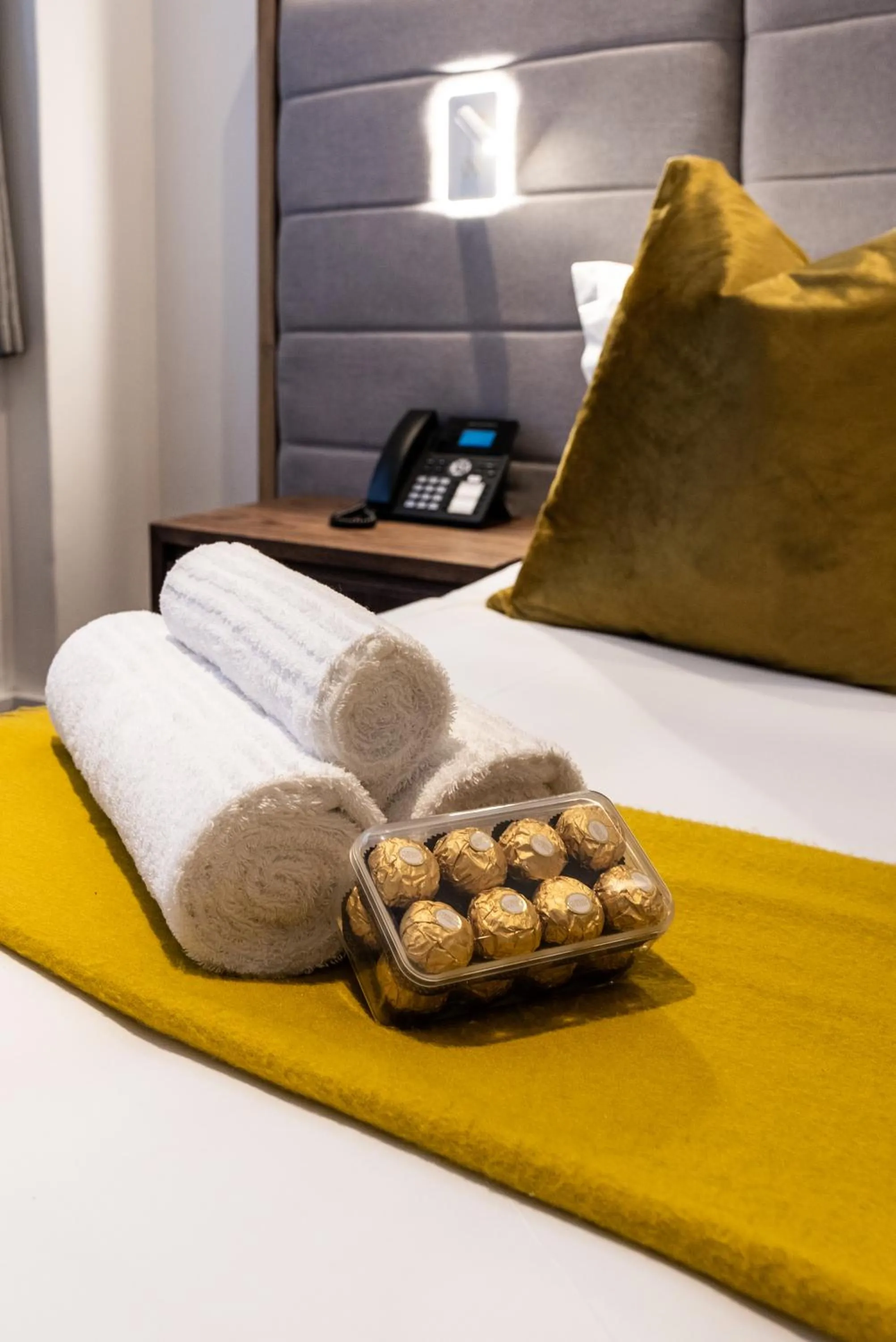 Bed in Cape Diamond Boutique Hotel